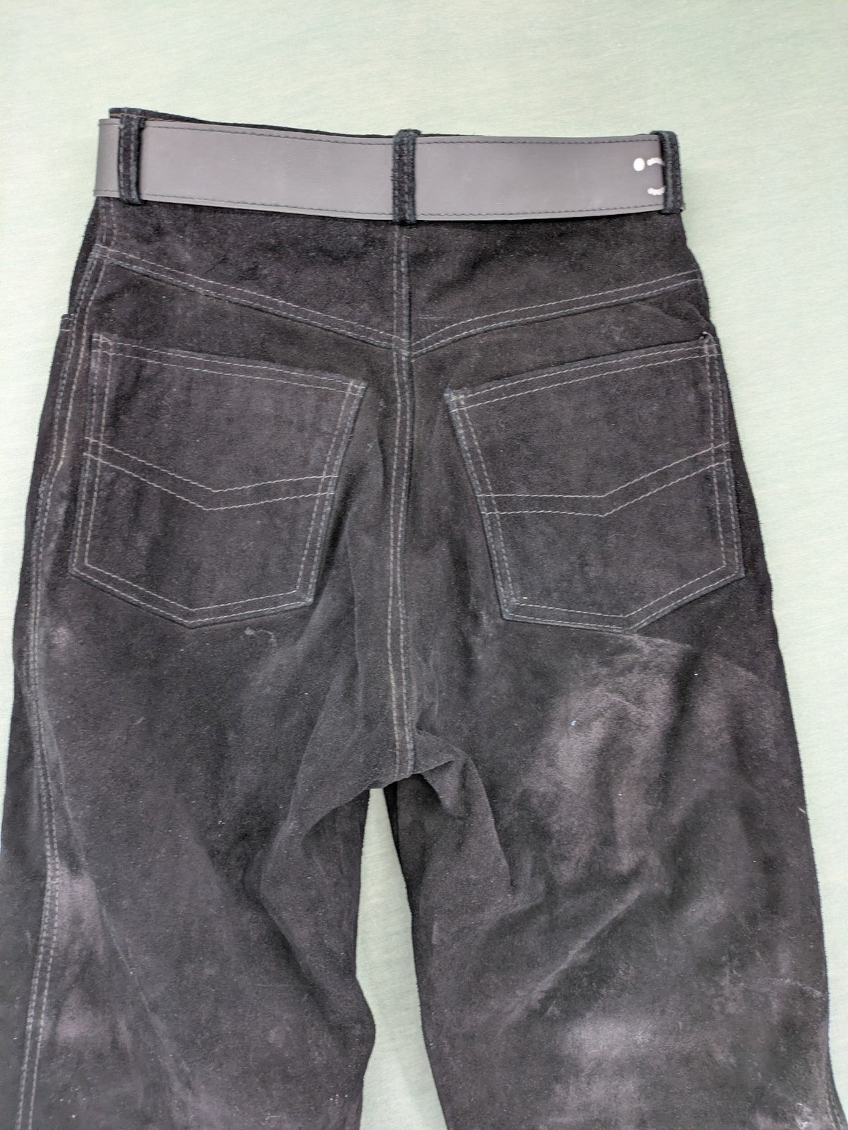 Silhouette black vintage pants high-waisted genuine suede five-pocket style with studded belt.