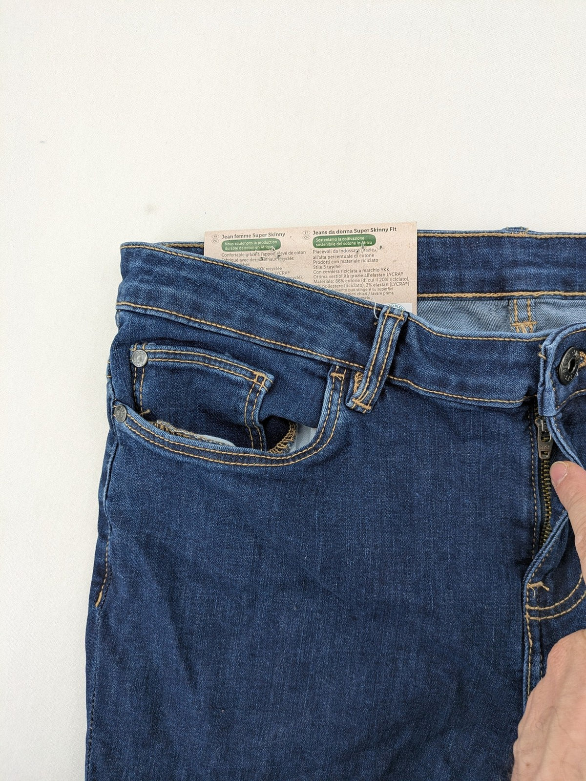 ESMARA blue super skinny jeans with dark wash and stretch denim material.