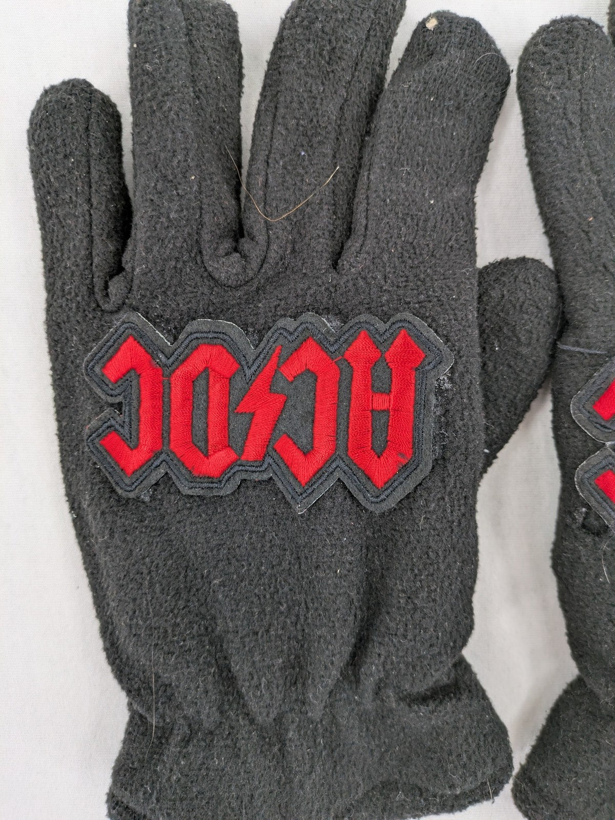 Merch black gloves soft fleece embroidered red AC/DC logo patch