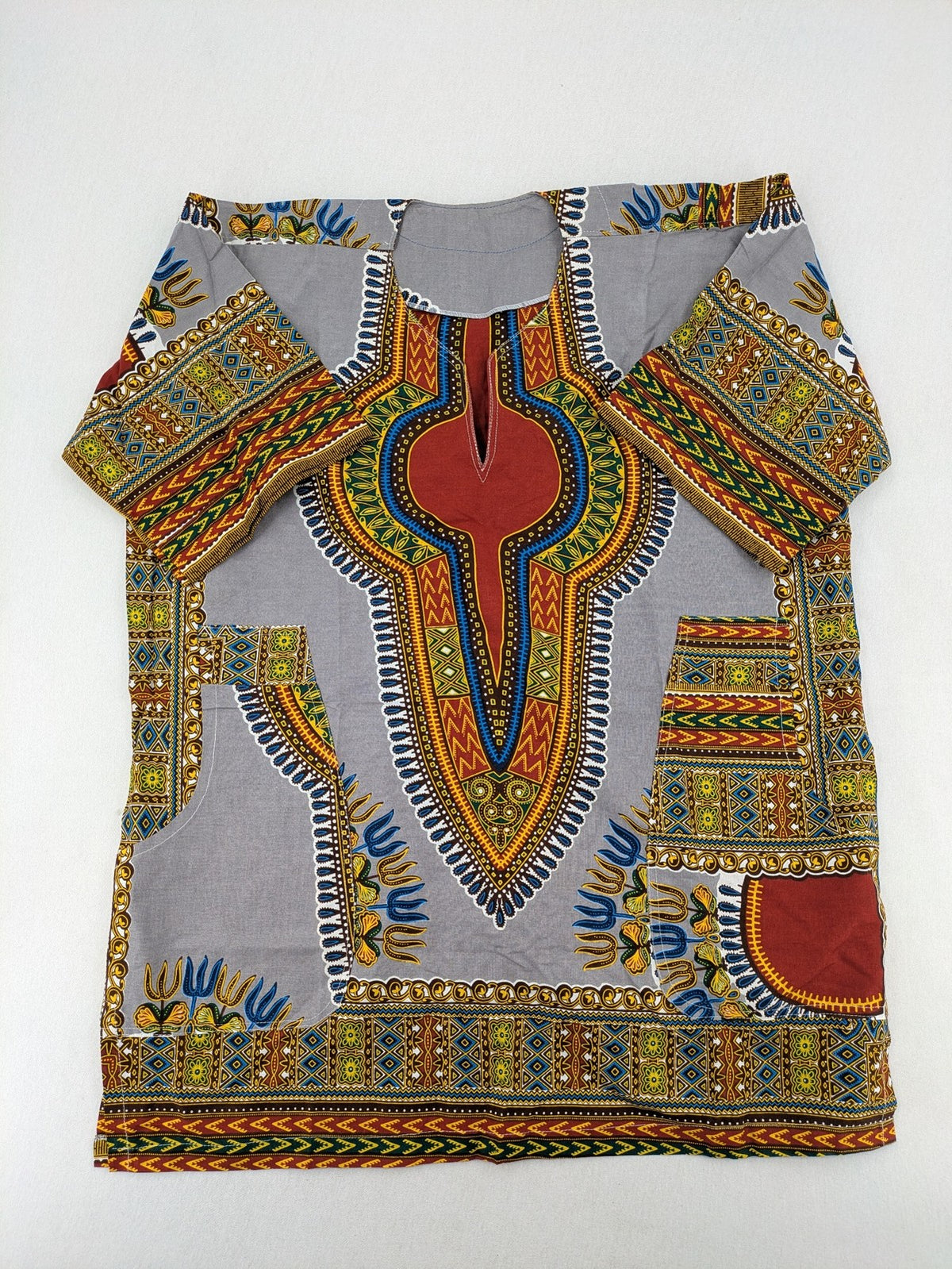 Kaftan multi Dashiki top grey with tribal patterns and front pockets, V-neck design.