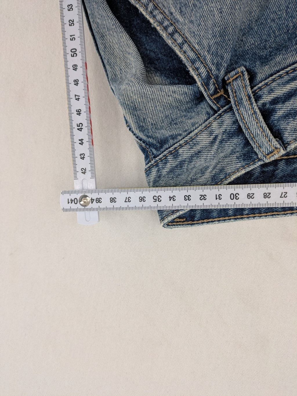 Bershka blue wide leg jeans high waist baggy style with light wash and cotton material.