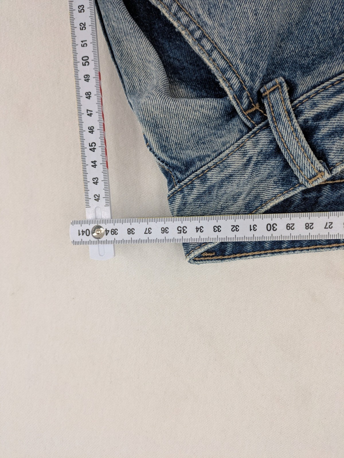 Bershka blue wide leg jeans high waist baggy style with light wash and cotton material.