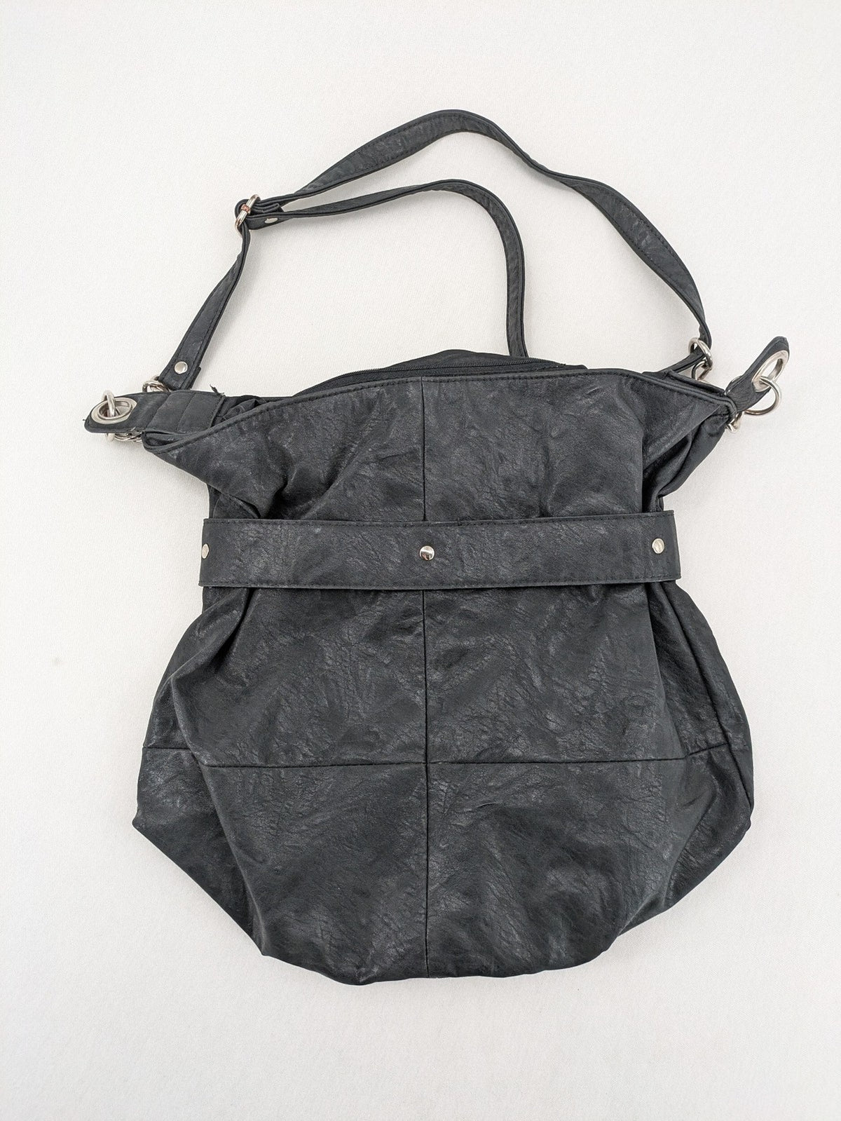 New Yorker black hobo handbag with silver chain details and large eyelets.