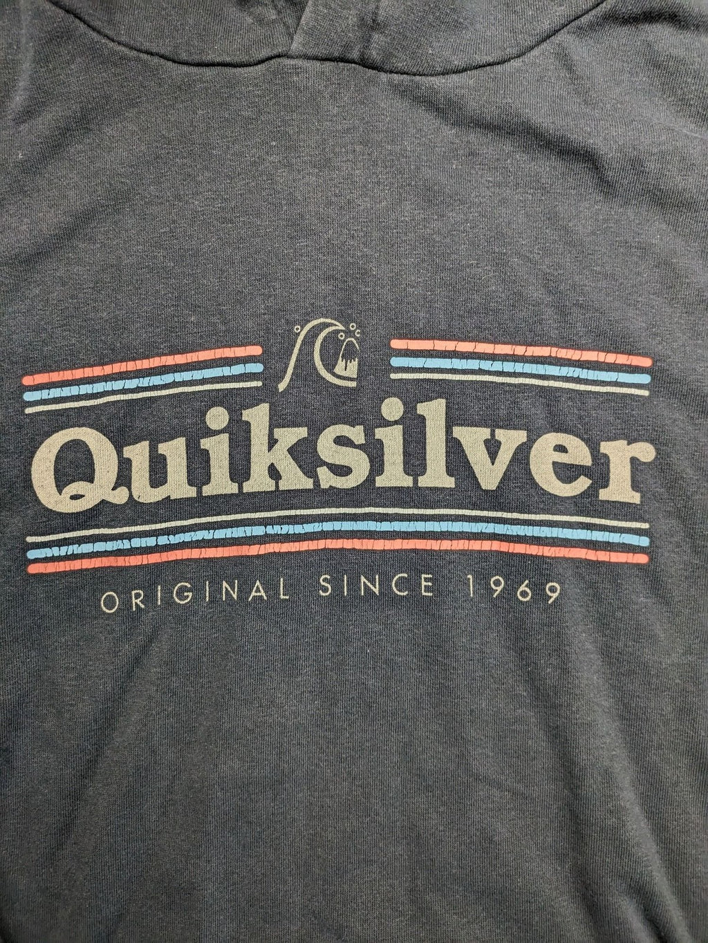 Quiksilver grey hoodie with logo graphic, kangaroo pocket, and adjustable hood.