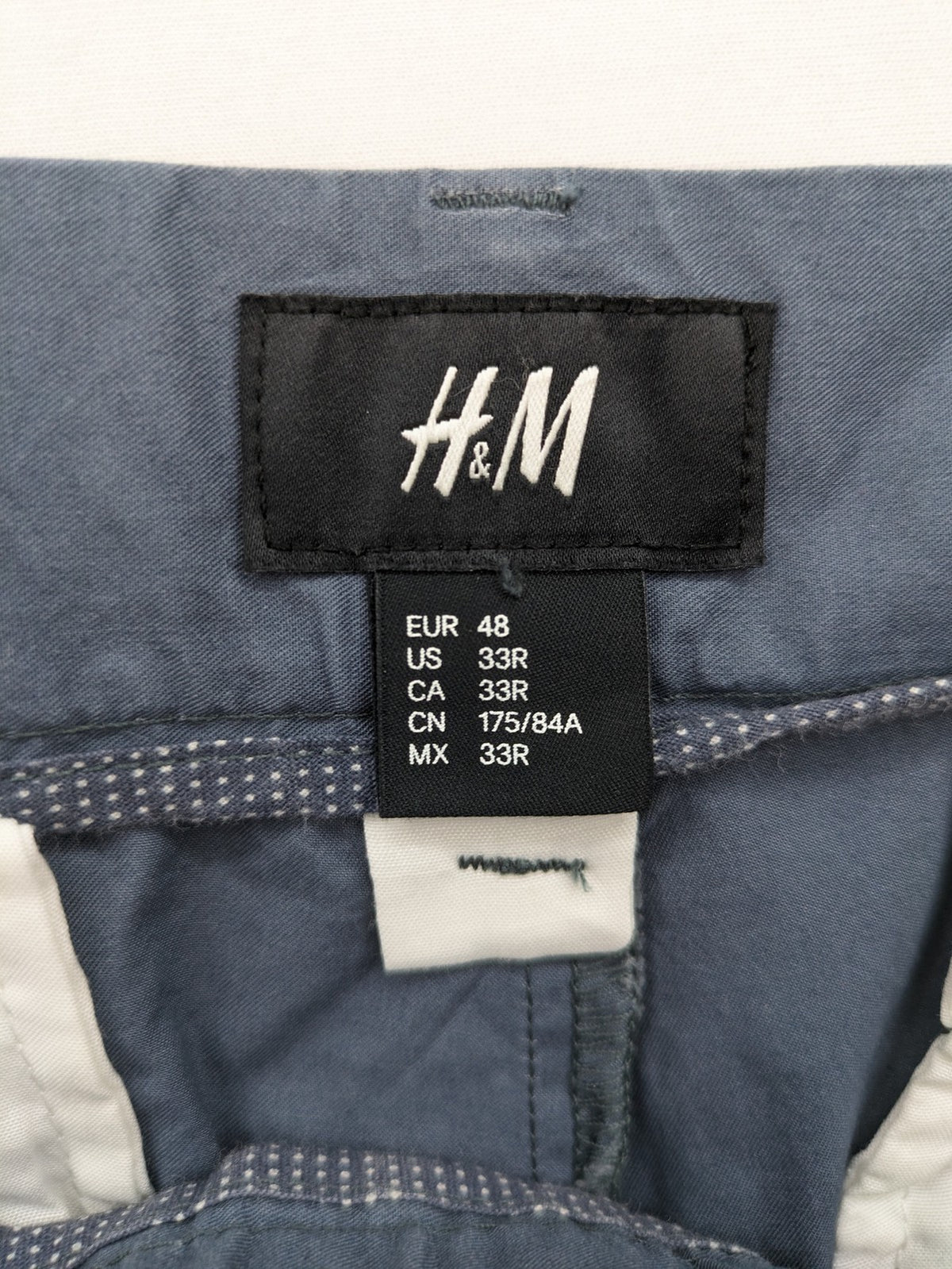 H&M blue chino shorts classic style with button and zipper, 100% cotton.