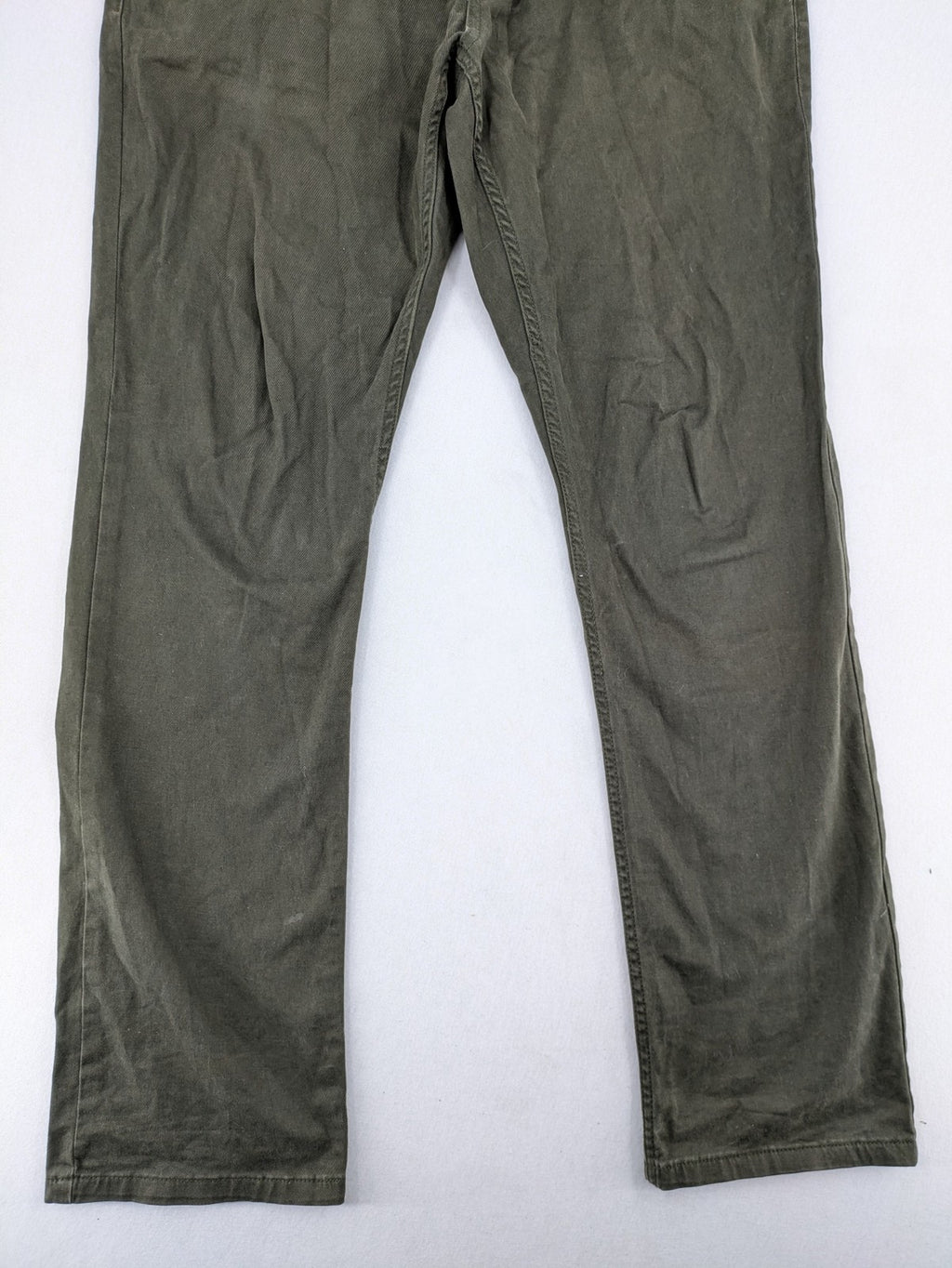Canda khaki straight jeans 5-pocket design with stretch cotton material.