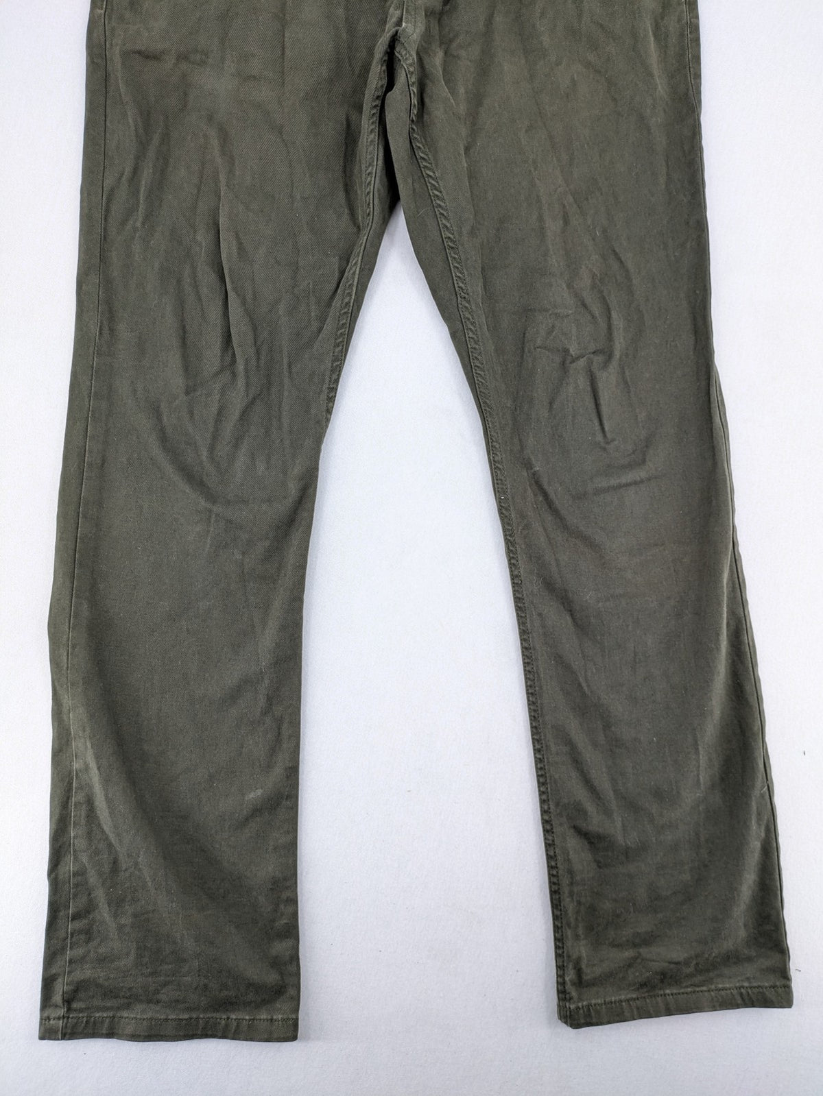 Canda khaki straight jeans 5-pocket design with stretch cotton material.