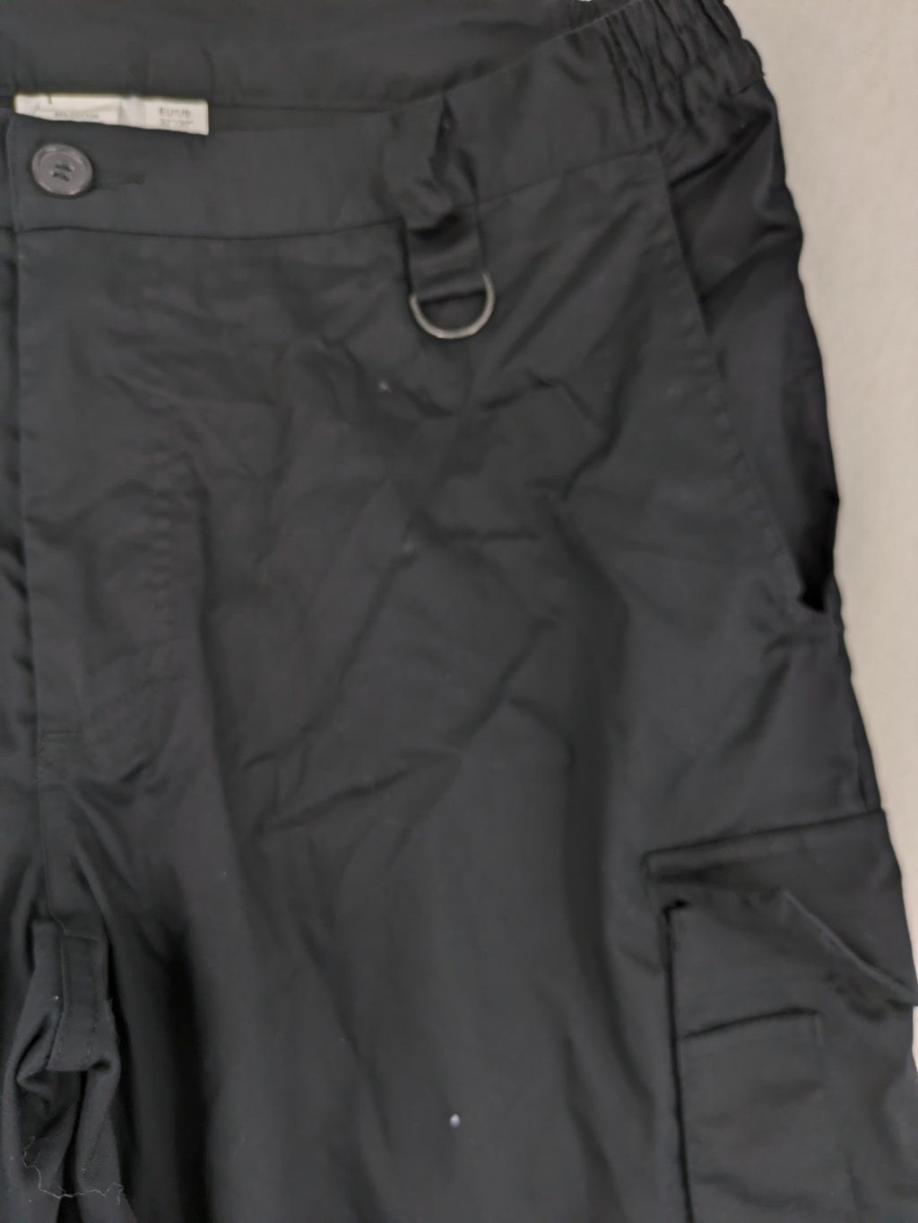 DHL grey cargo pants with iconic logo and multiple pockets, made from stretch cotton.