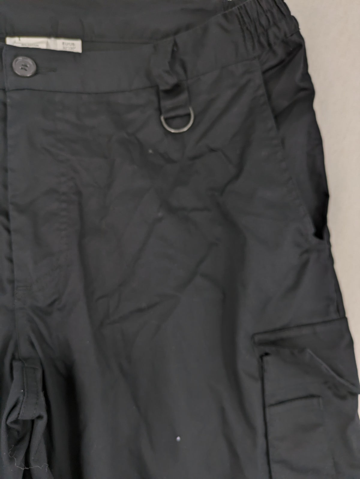 DHL grey cargo pants with iconic logo and multiple pockets, made from stretch cotton.