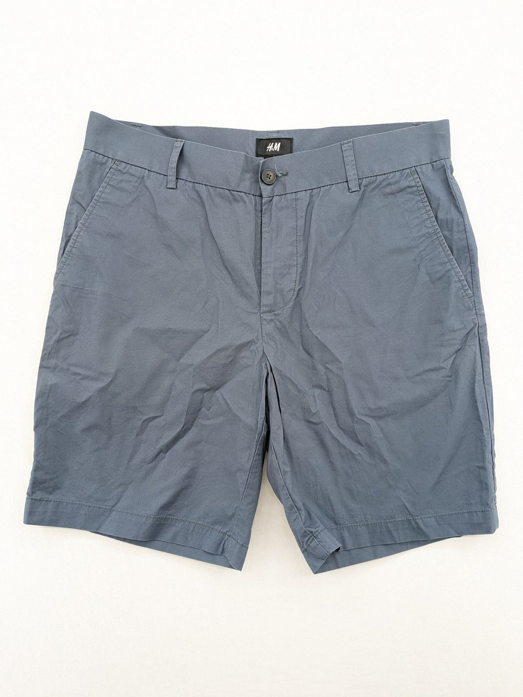 H&M blue chino shorts classic style with button and zipper, 100% cotton.