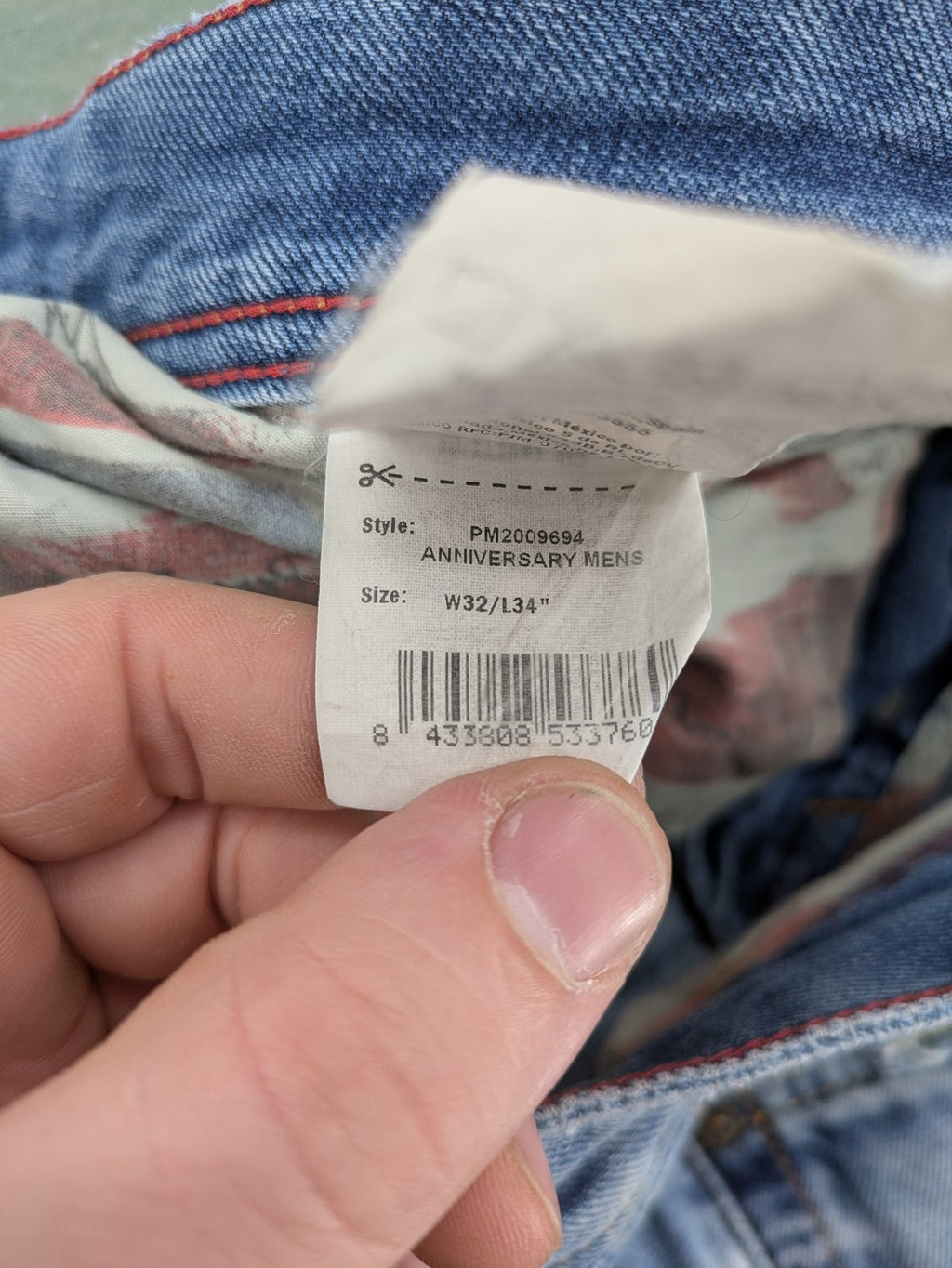 Pepe Jeans blue straight jeans with Union Jack embroidery and distressed denim finish.