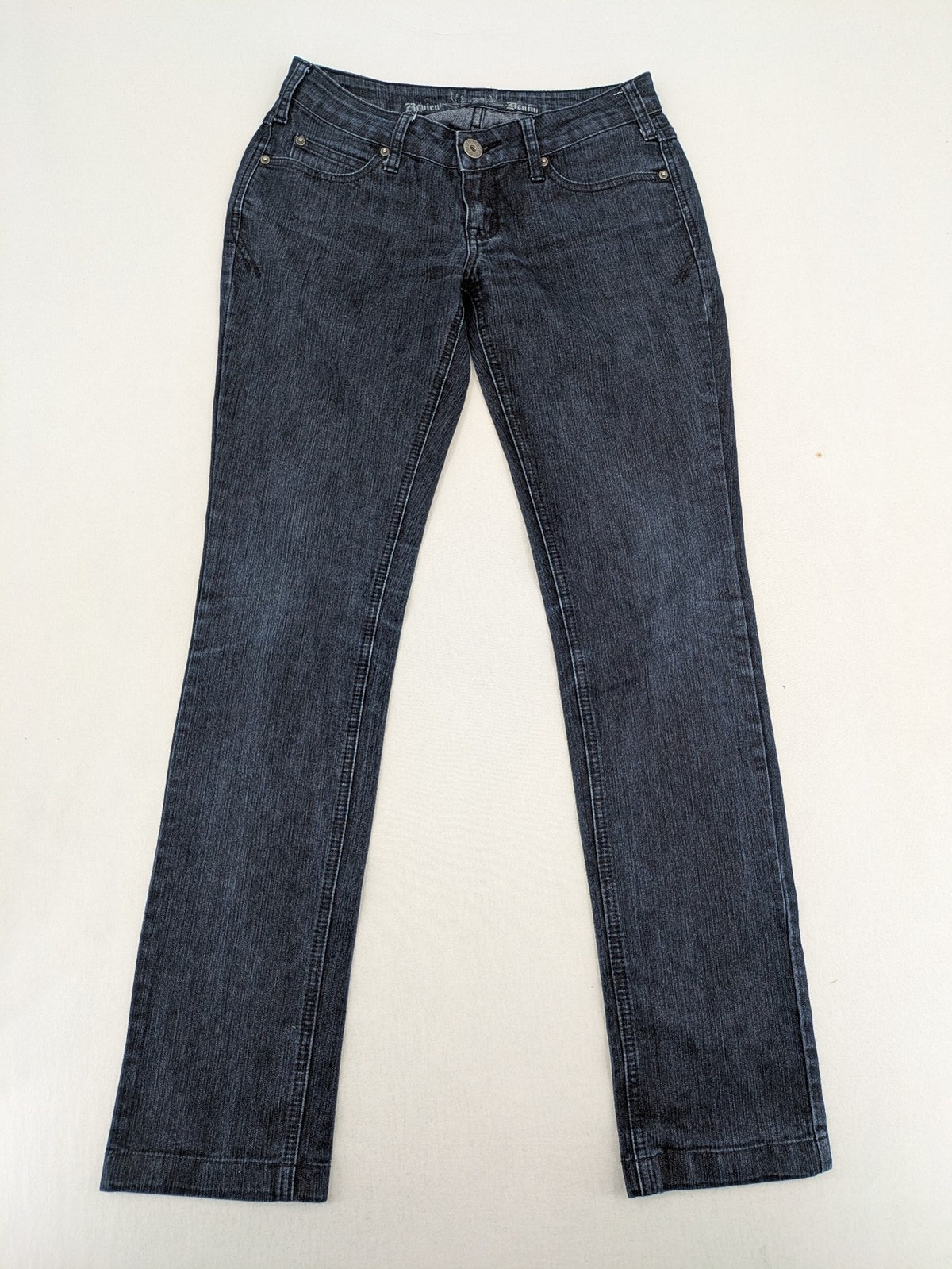 Review straight leg jeans dark blue low rise stretch denim with classic design.
