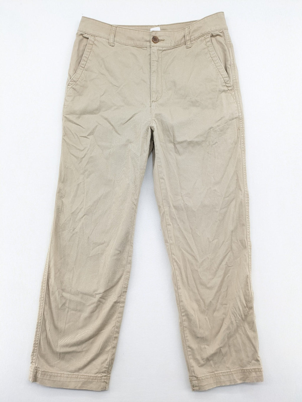 Gap beige girlfriend chino pants with relaxed fit and soft cotton-stretch blend.