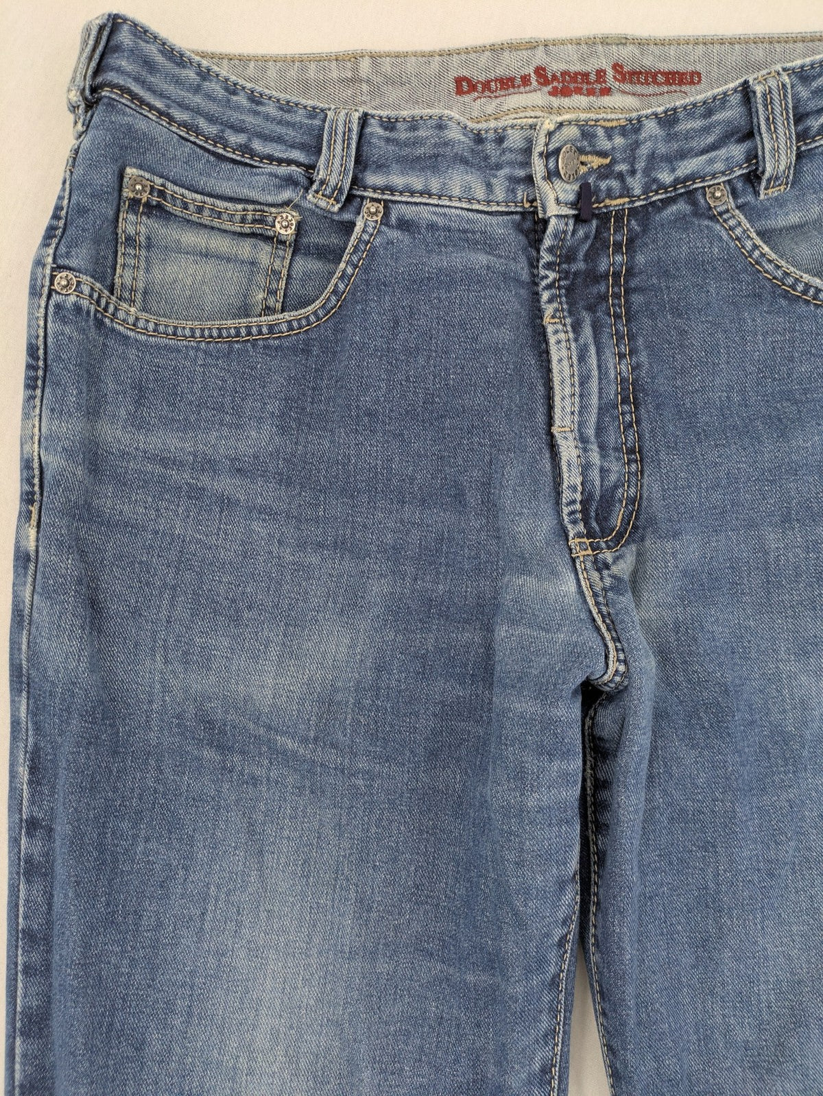 Joker blue straight leg jeans with double saddle stitched detail and classic denim wash.