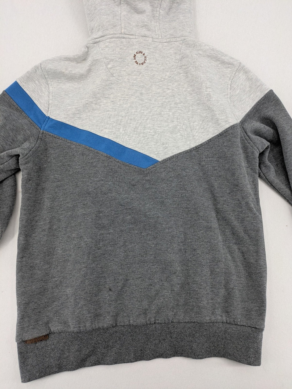 ALIFE turtle neck jumper blue grey colorblock design with logo details and soft cotton blend.