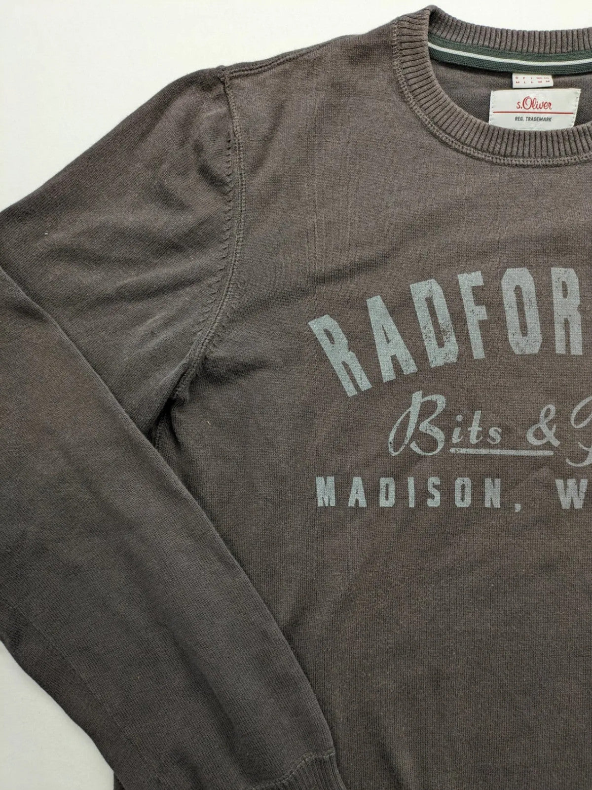 s.Oliver brown turtle neck jumper with "Radford Inc." graphic print and ribbed cuffs.
