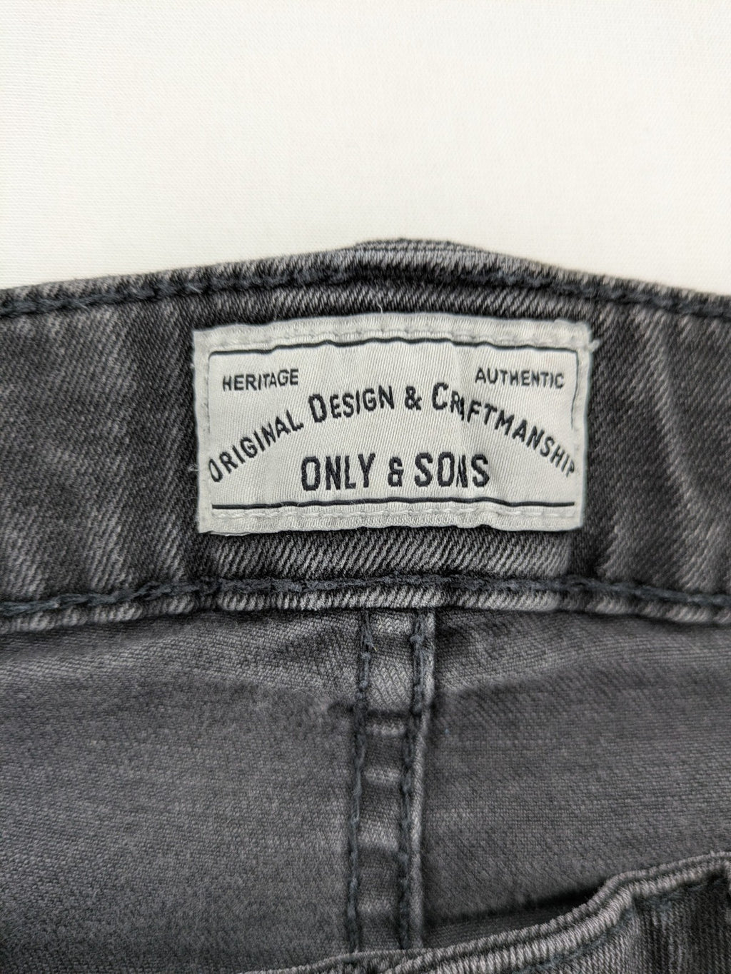 Only & Sons grey slim fit jeans with ripped details and open hem, stretch denim.