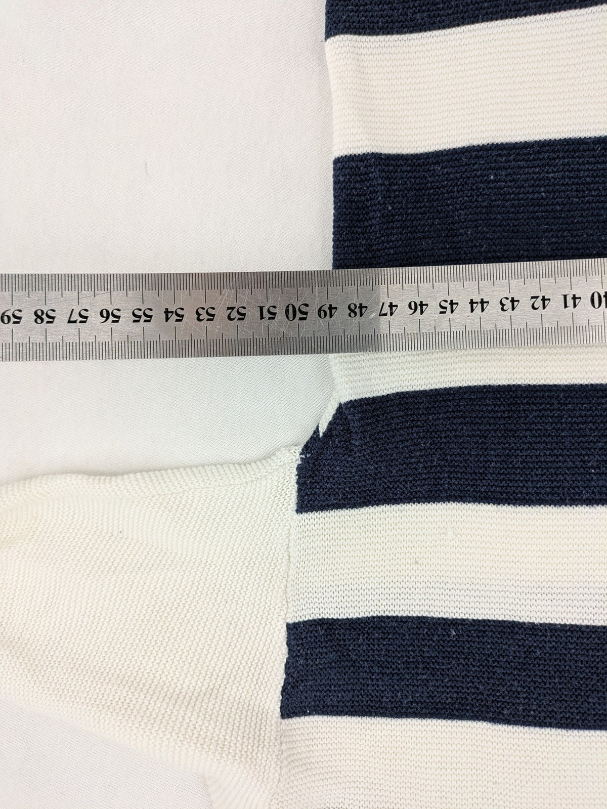 Tom Tailor cream turtle neck jumper with navy stripes and red accent, featuring anchor embroidery.