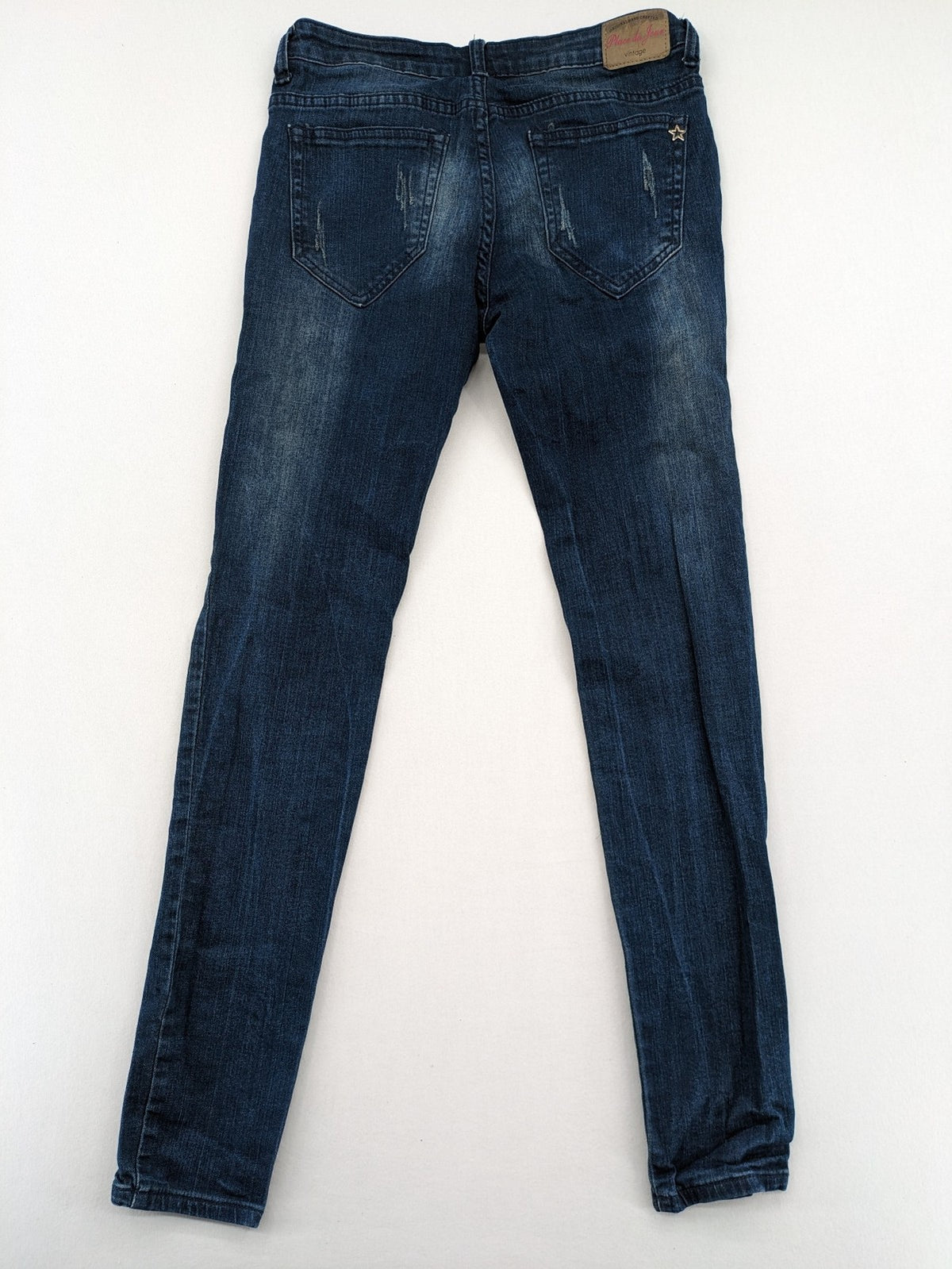 Place du Jour blue biker jeans with zippers, used-look wash, and star rivet detail.