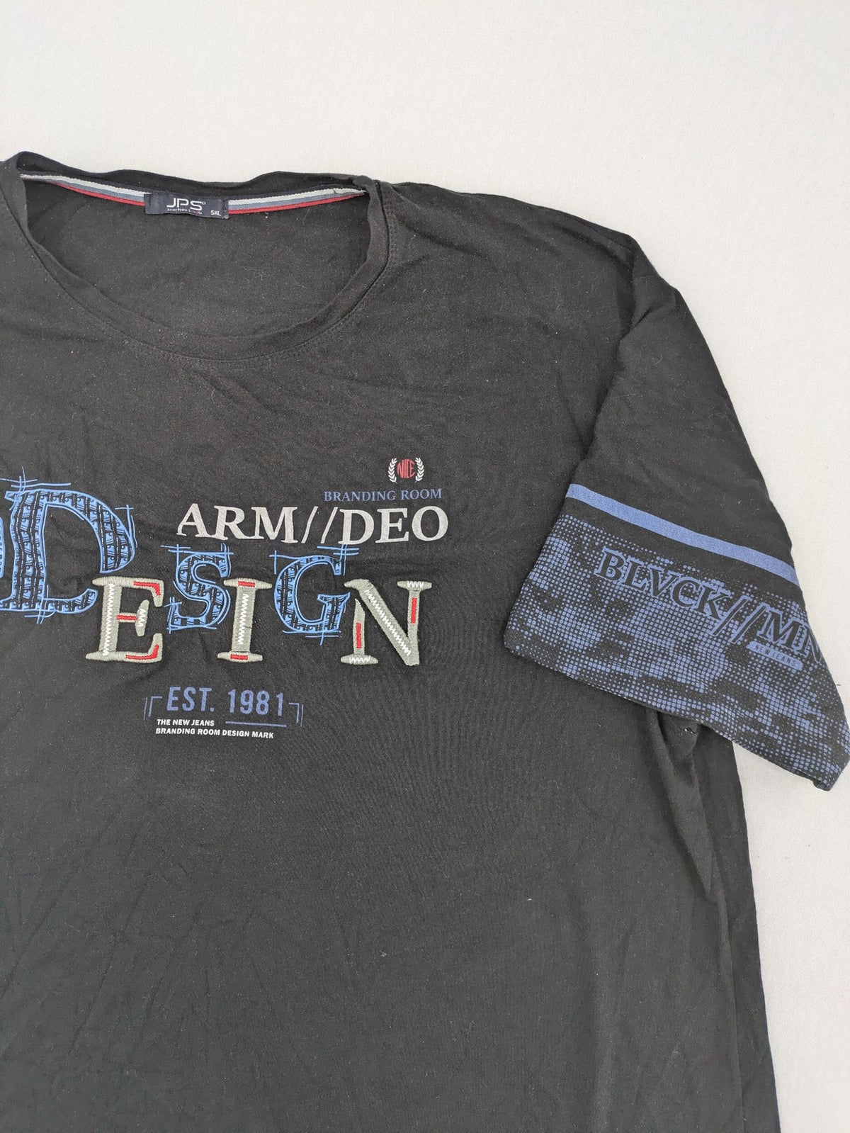 Pedro multi graphic t-shirt size 5XL with embroidered design and contrasting sleeve patterns.
