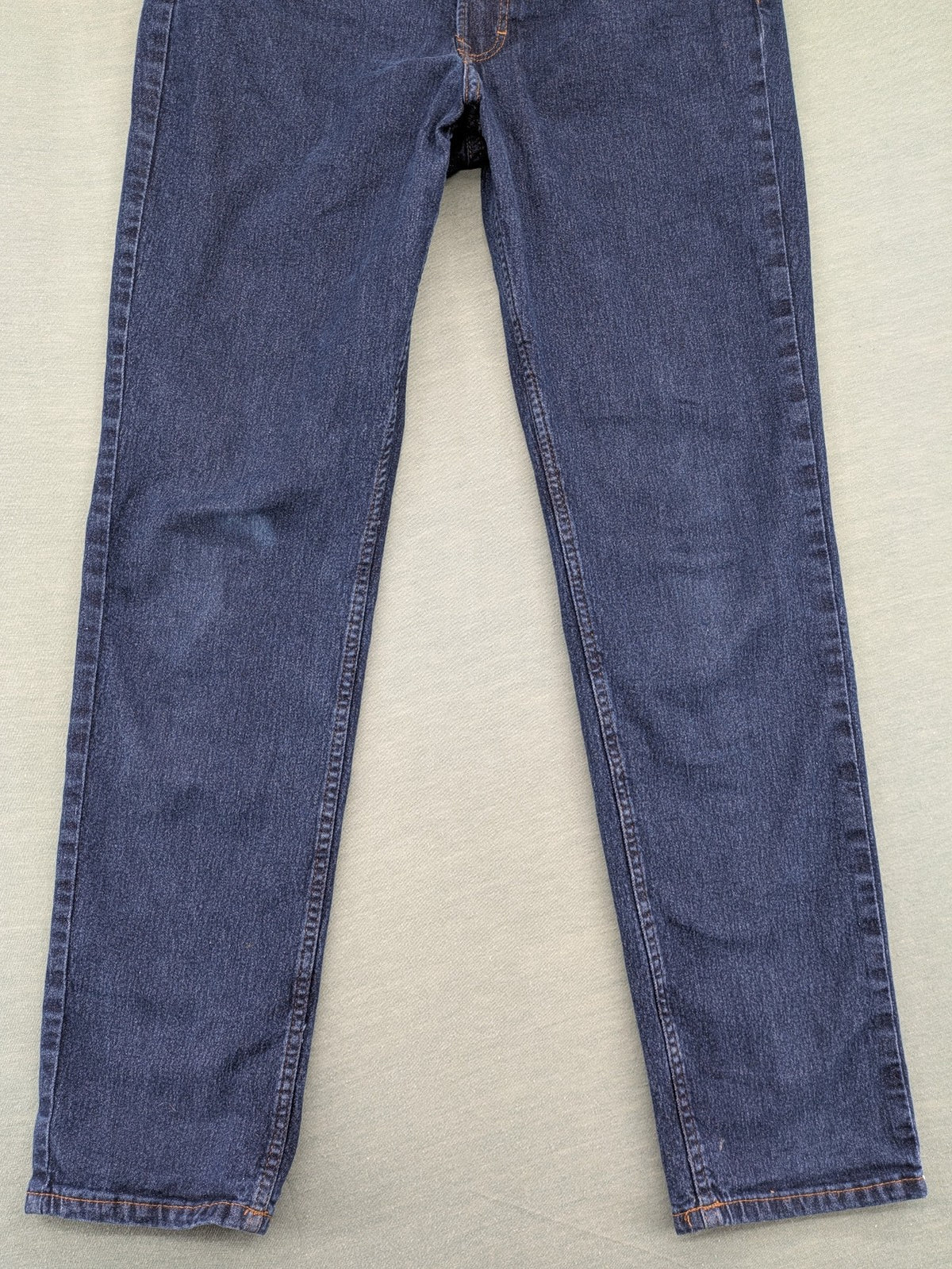 H&M blue straight jeans with adjustable waistband and classic 5-pocket design.