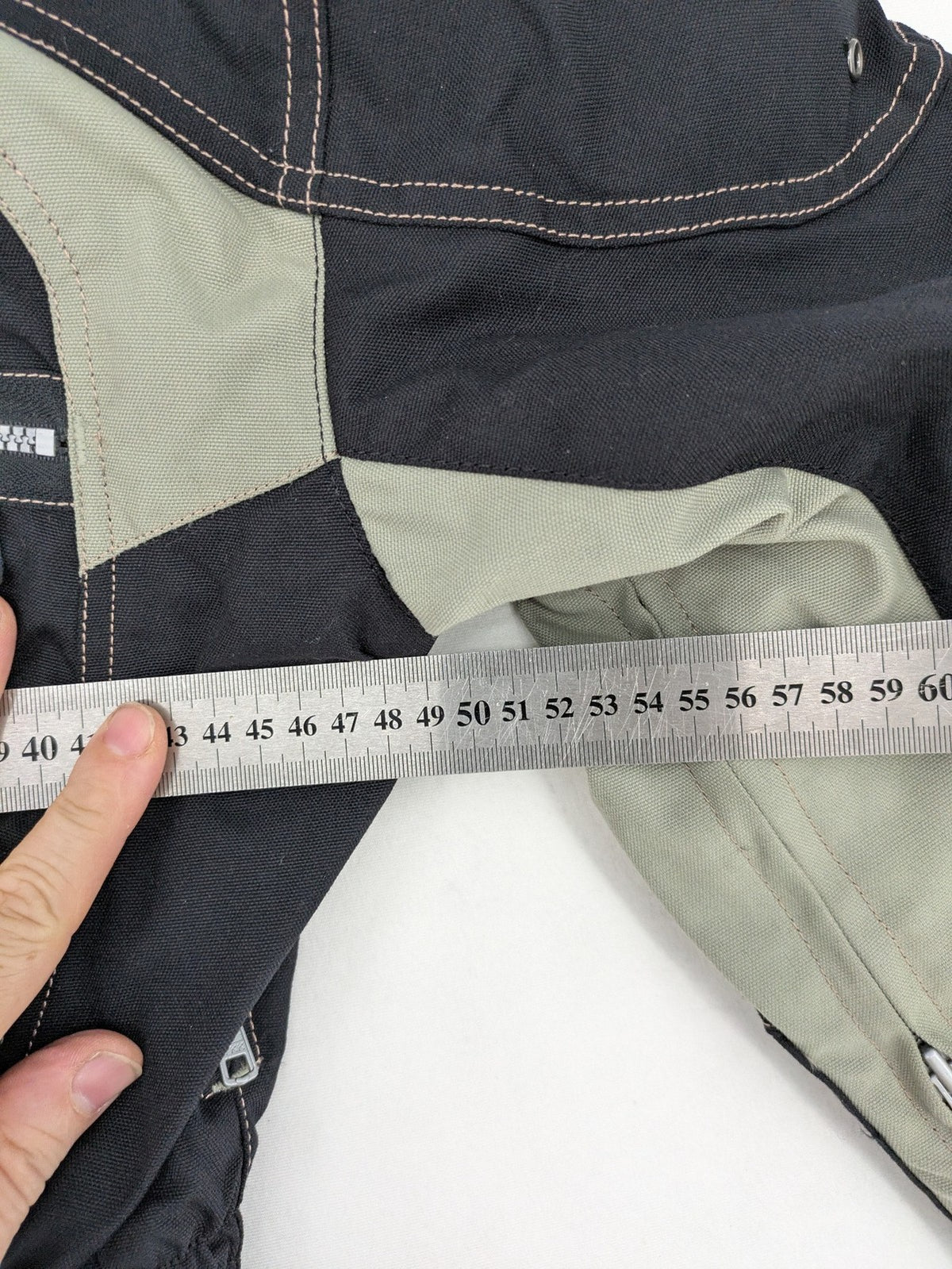 Polo multi biker jacket nylon with adjustable fit and multiple pockets.