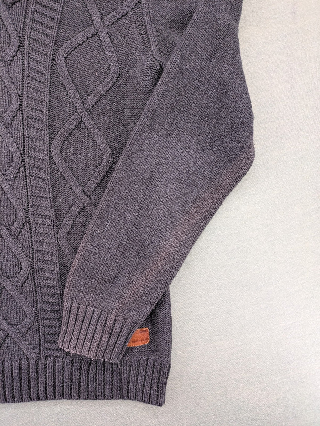 IZAC grey turtle neck jumper with cable knit pattern and used look finish.
