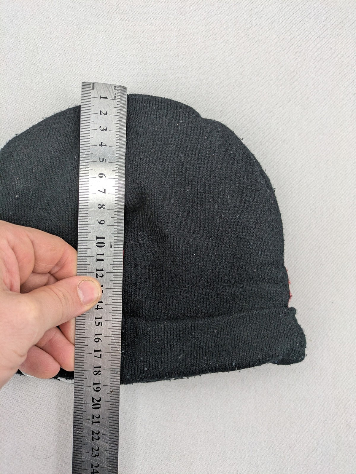 Star Wars black and red reversible beanie featuring Chewbacca graphic and logo.