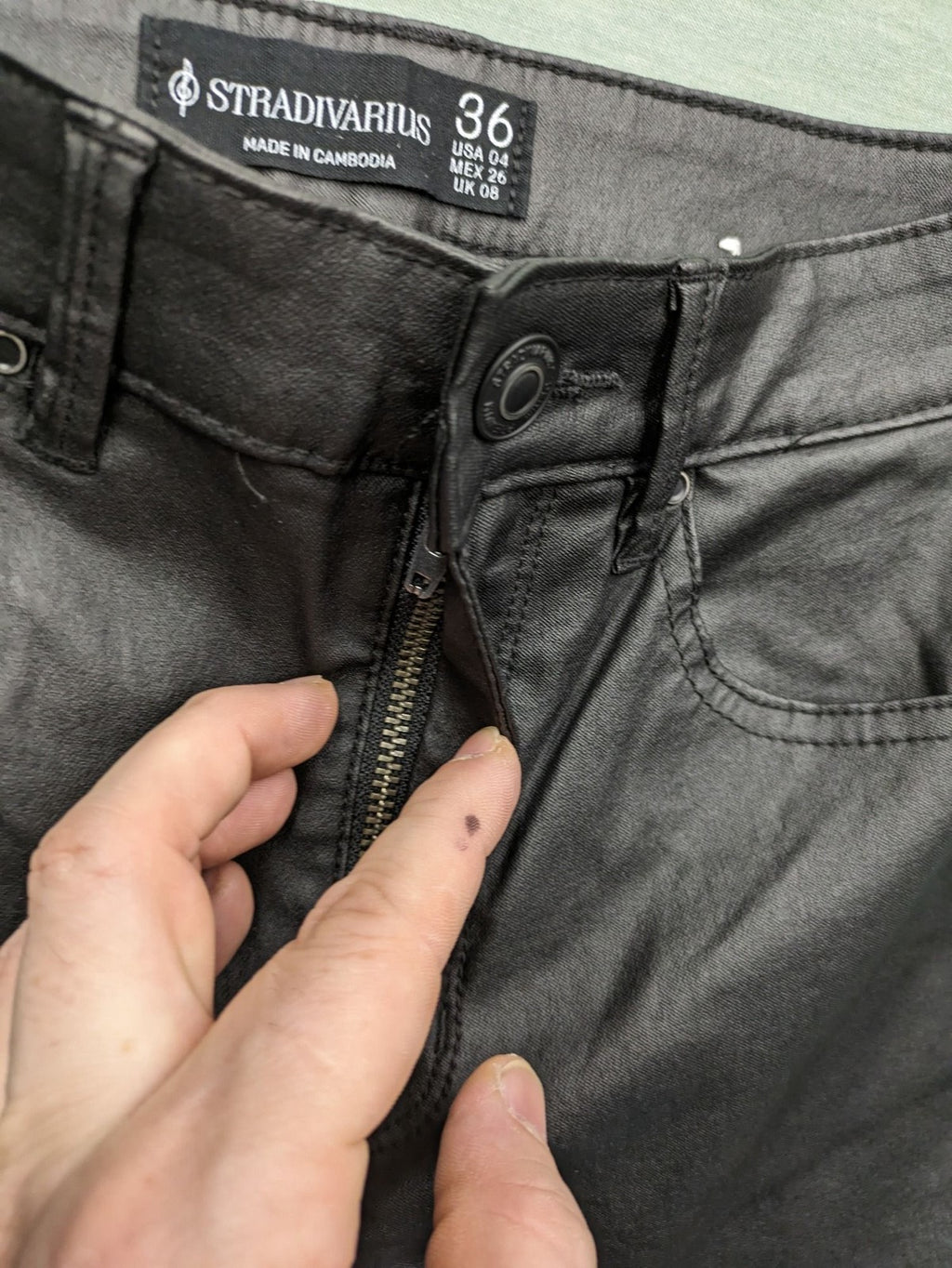 Stradivarius black coated skinny jeans faux leather finish stylish silhouette