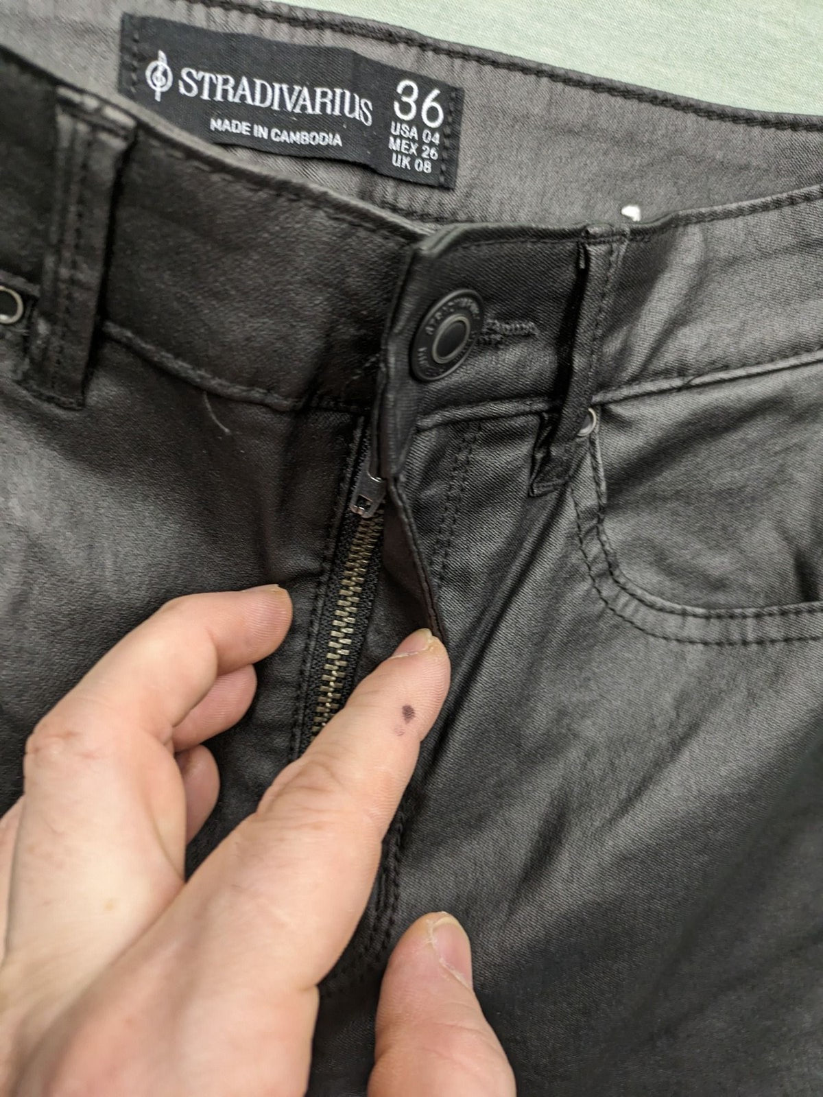 Stradivarius black coated skinny jeans faux leather finish stylish silhouette