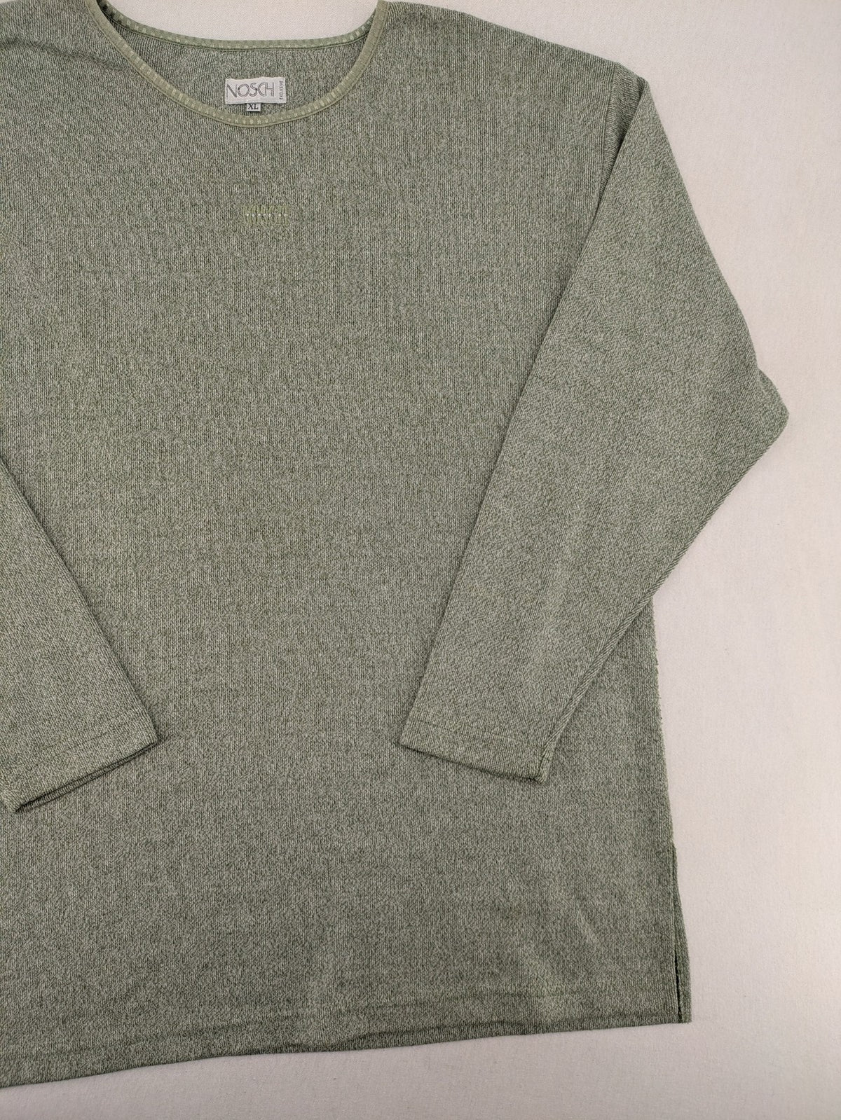 NOSCH knit jumper grey textured fabric with embroidered logo and subtle rhinestone accents.