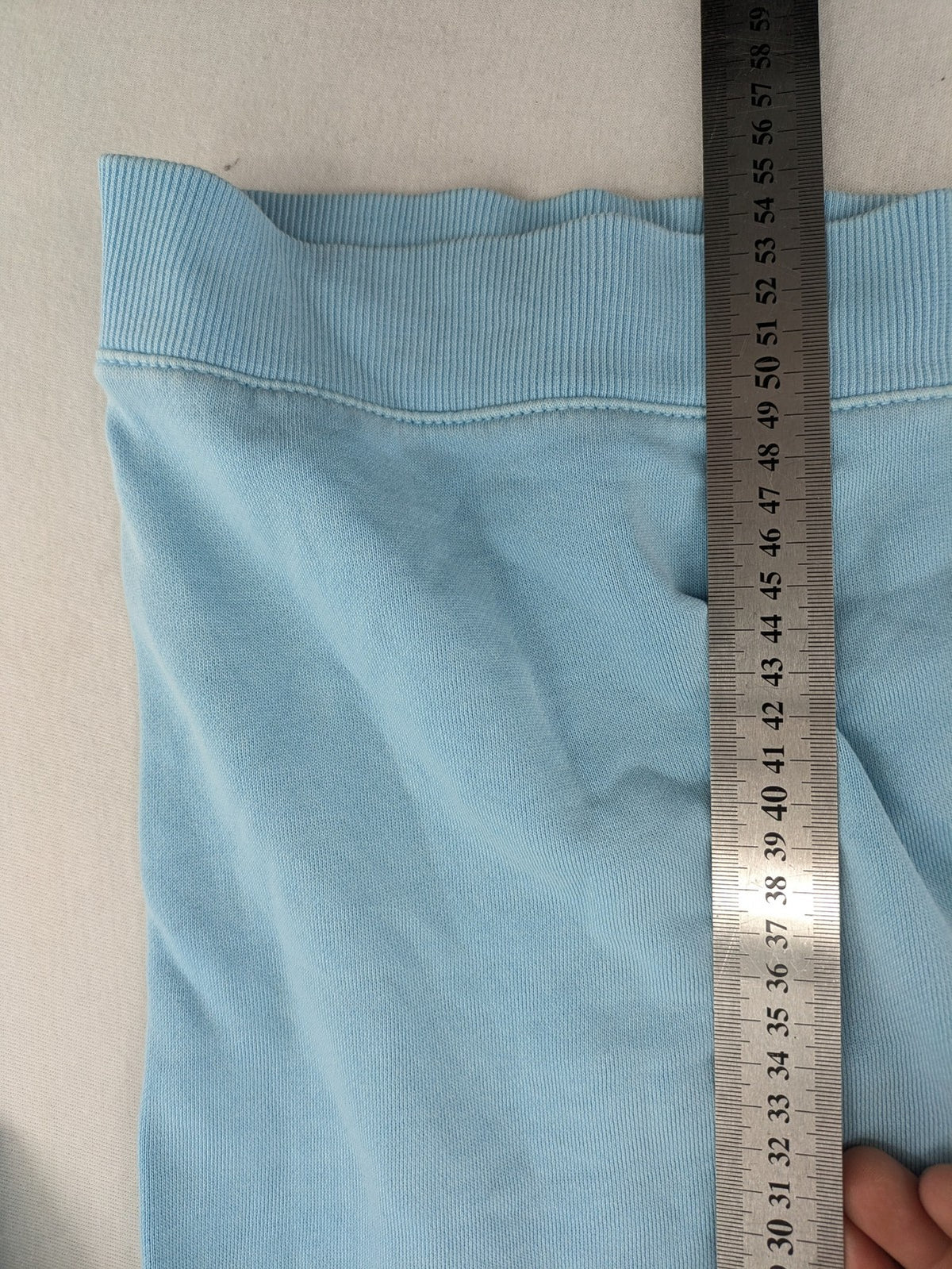 Country Road blue turtle neck jumper with embossed logo on chest, made from cotton.