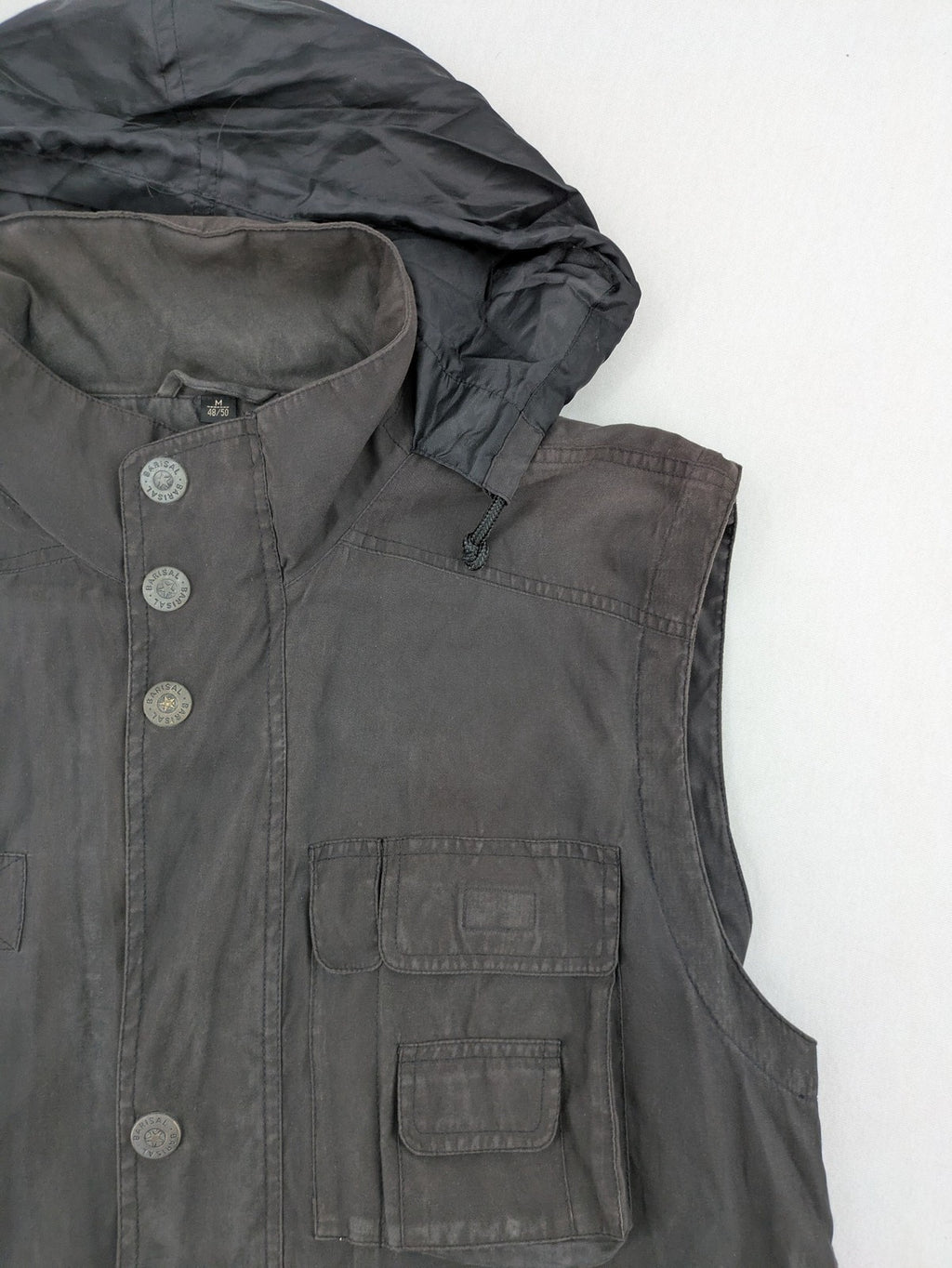 Barisal grey coat with hood, cargo pockets, and checkered lining detail.