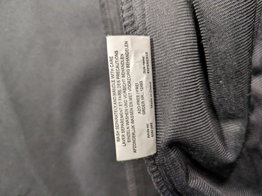 Life Line grey softshell jacket with adjustable hood and durable wind-resistant material.