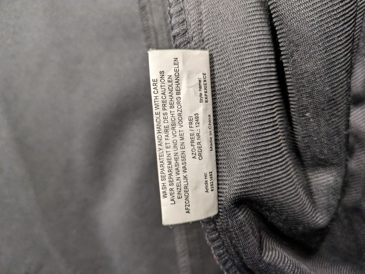 Life Line grey softshell jacket with adjustable hood and durable wind-resistant material.