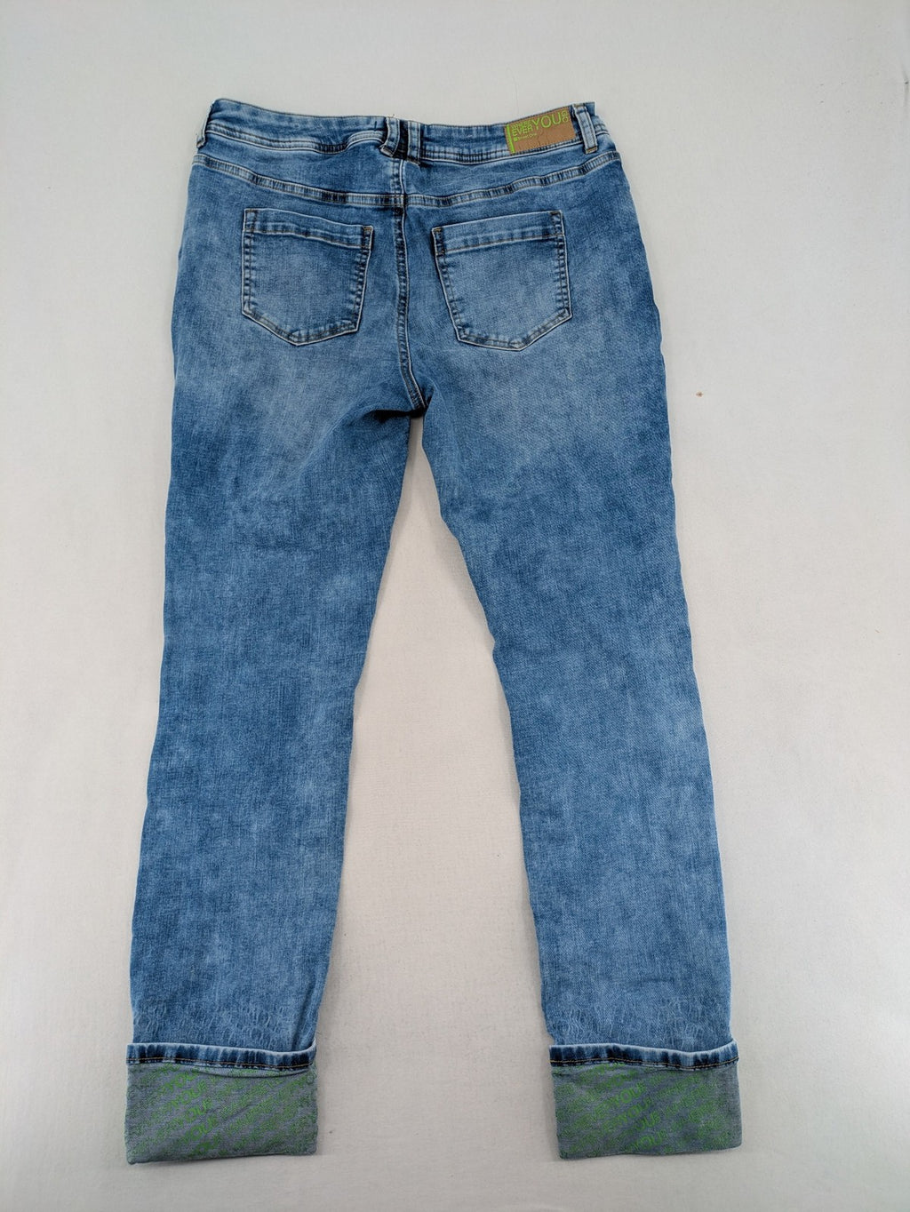Street One blue straight jeans with green patterned cuffs and button fly detail.