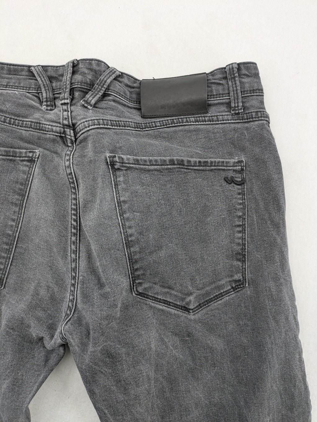 LTB grey slim tapered jeans with washed denim finish and subtle logo detail.