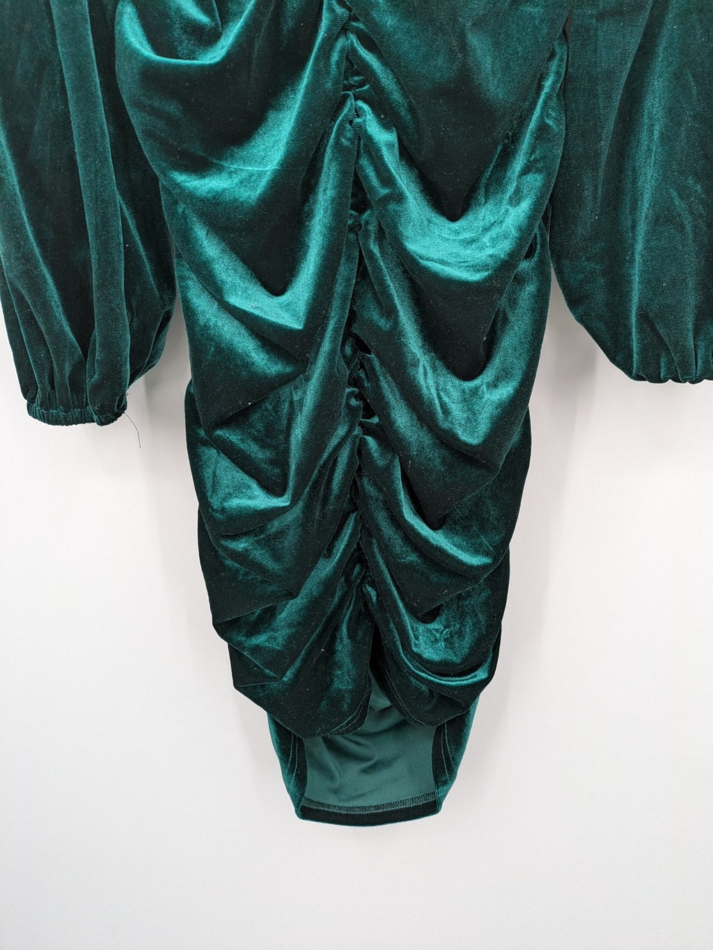 SHEIN green bodycon dress with ruched details, square neckline, and long puff sleeves.