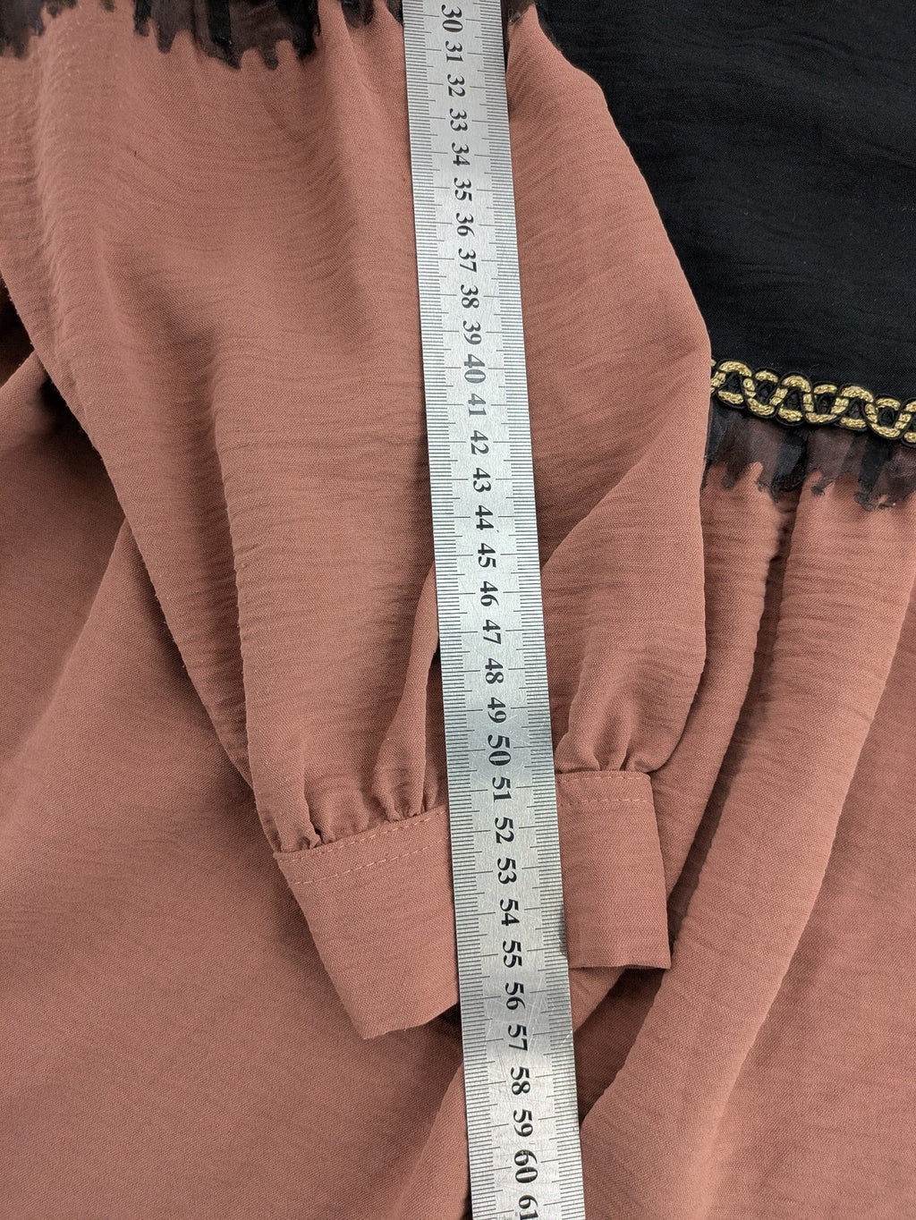Efsun Moda grey and pink A-line dress with gold decorative chains and long balloon sleeves.