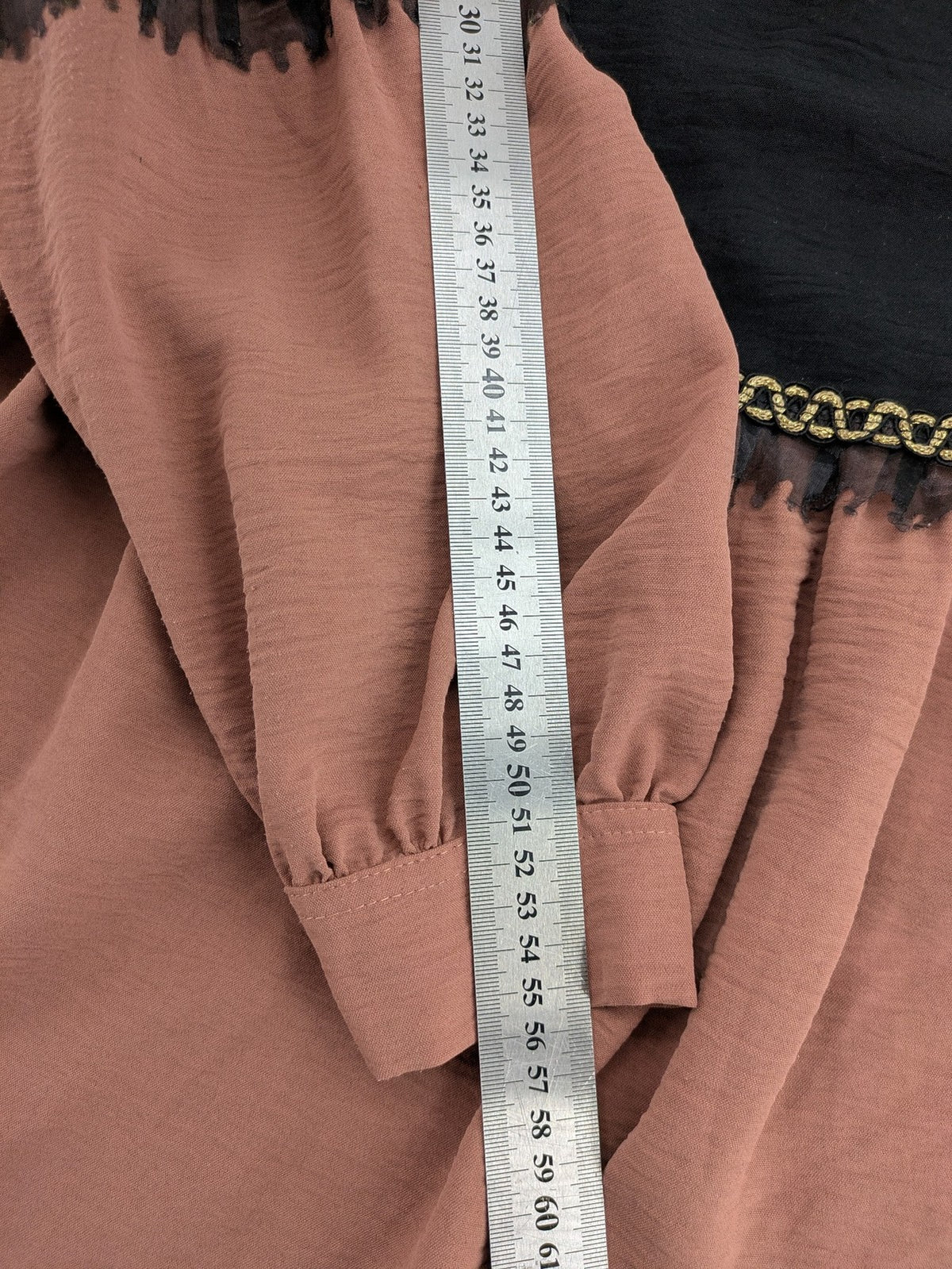 Efsun Moda grey and pink A-line dress with gold decorative chains and long balloon sleeves.