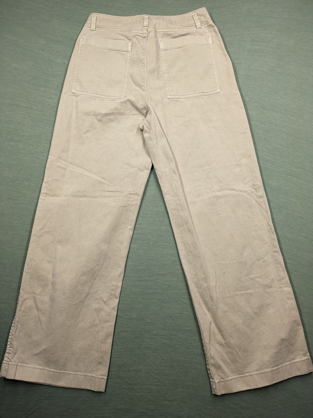 Gap beige loose-fit chino pants made from 100% cotton with relaxed wide-leg design.