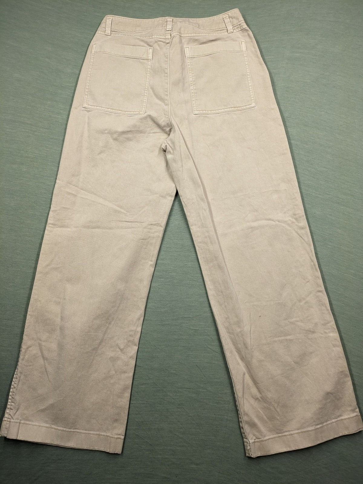 Gap beige loose-fit chino pants made from 100% cotton with relaxed wide-leg design.