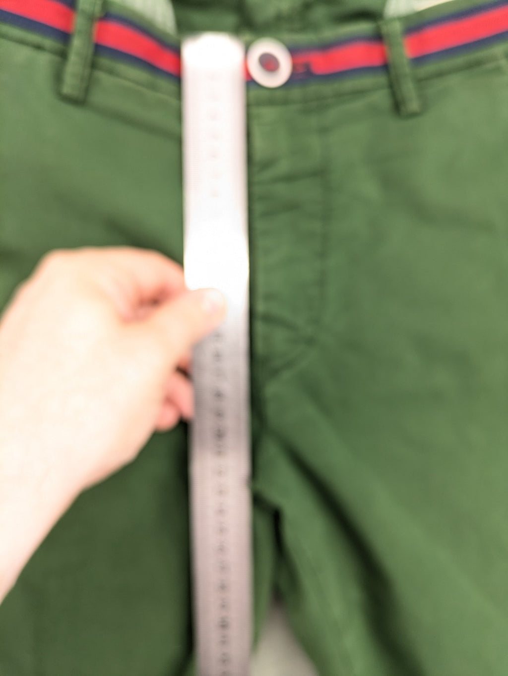 Mason's green chino pants with striped red and blue waistband, cotton stretch material.