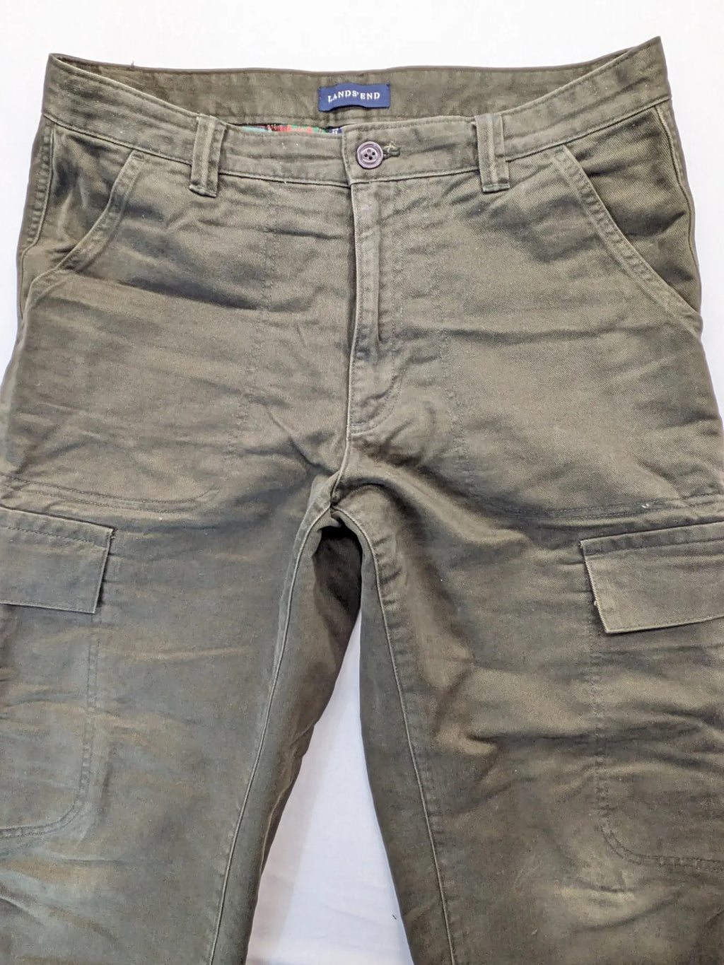 Lands' End green cargo pants with plaid flannel lining and traditional fit design.
