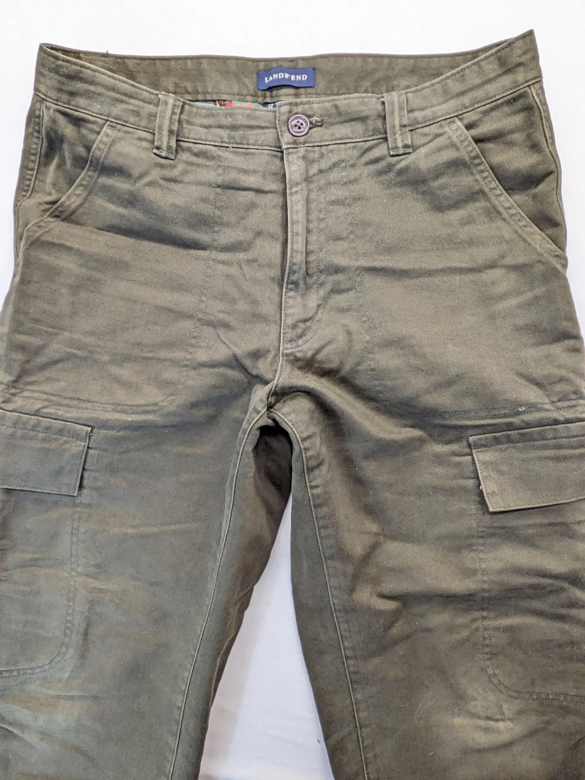 Lands' End green cargo pants with plaid flannel lining and traditional fit design.