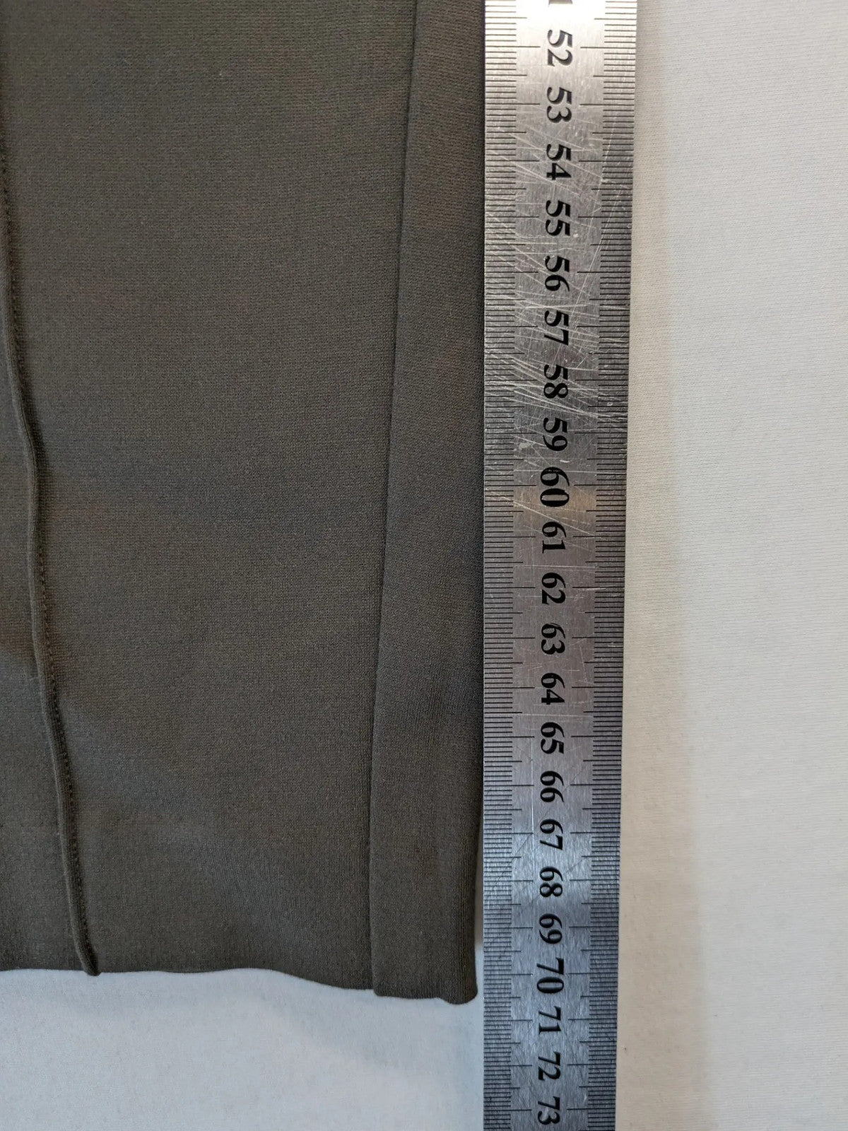 H&M khaki pants with front seam detail and stretchy material for comfort.