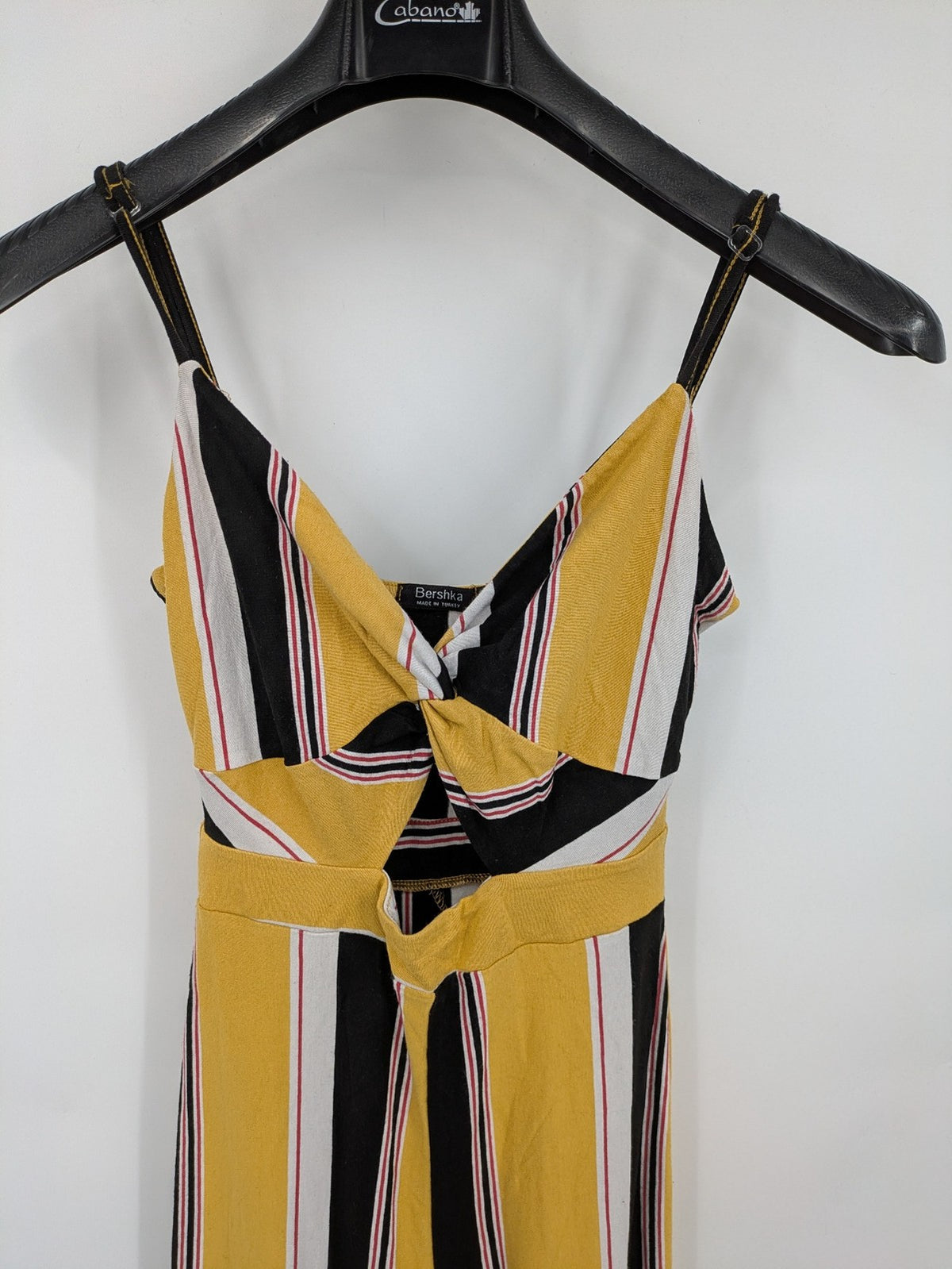 Bershka multi jumpsuit vertical striped pattern yellow, black, white, knot detail, cut-out waist.