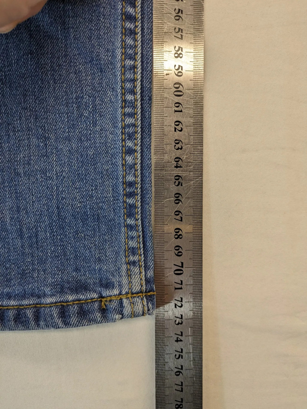 Hero By John Meddox blue straight jeans with five-pocket design and zip fly.