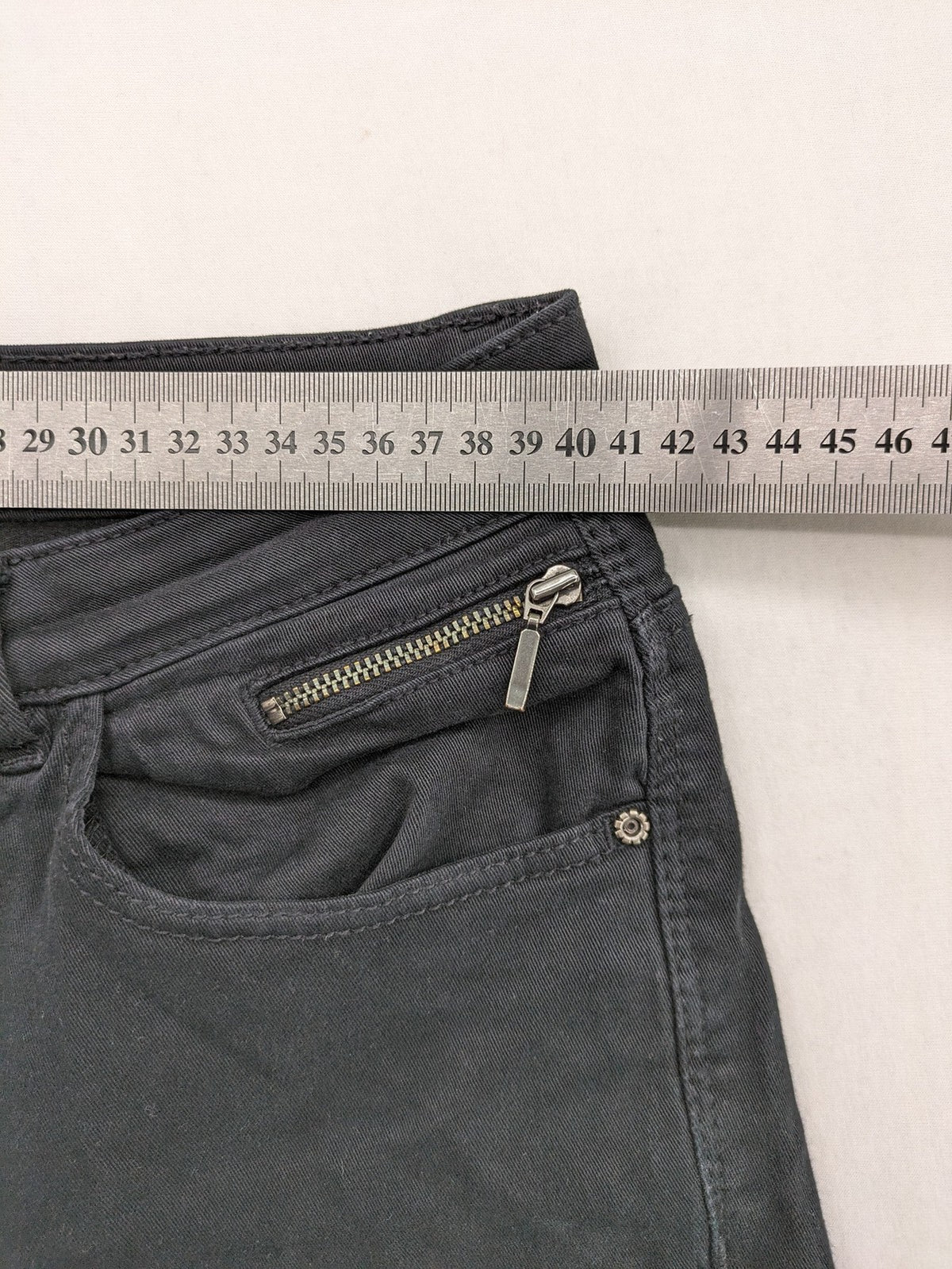 Esprit black skinny jeans with zipper details and cotton-stretch material.