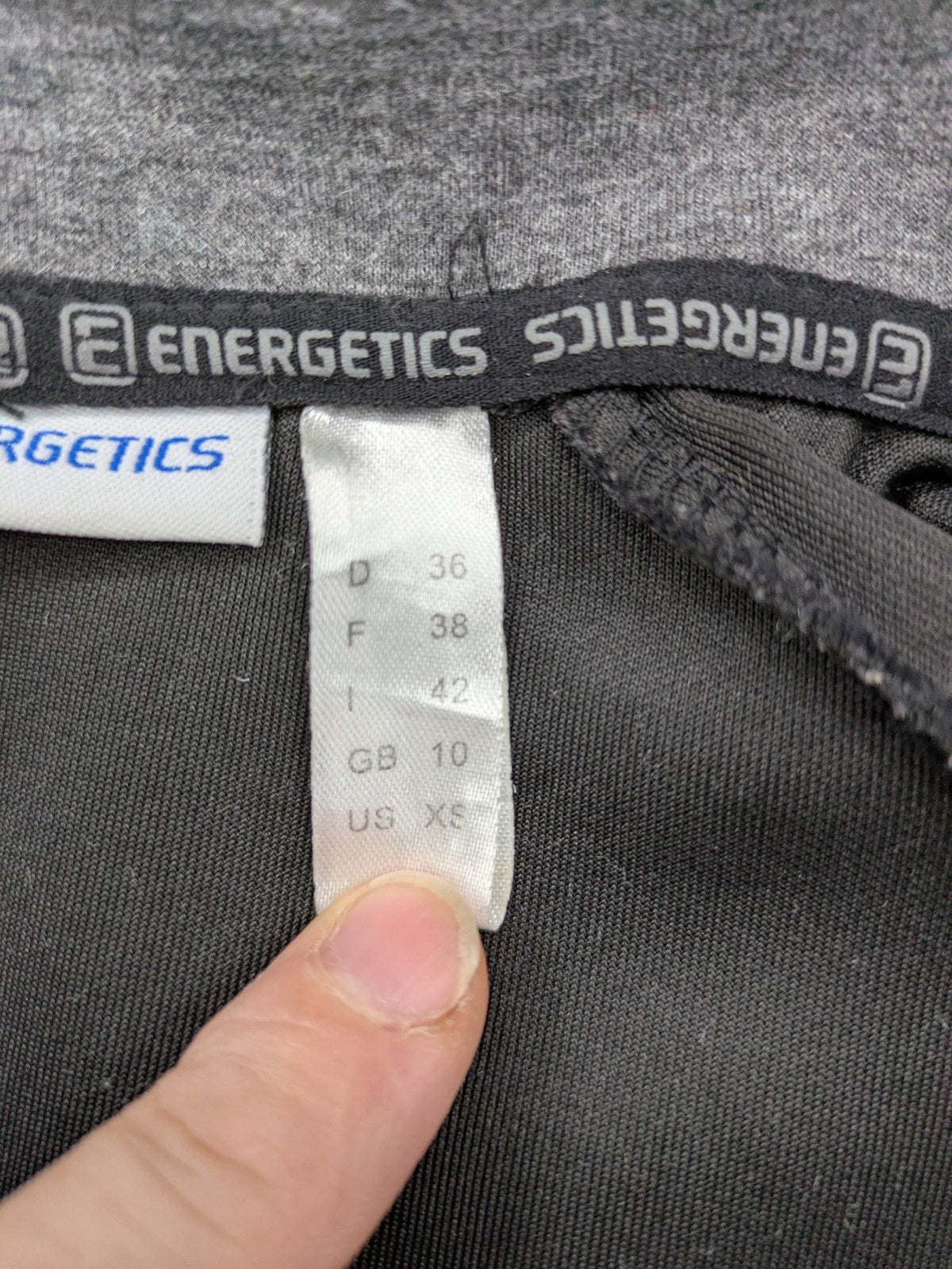 Energetics hybrid jacket black grey with High Peak patch and zip-up design.